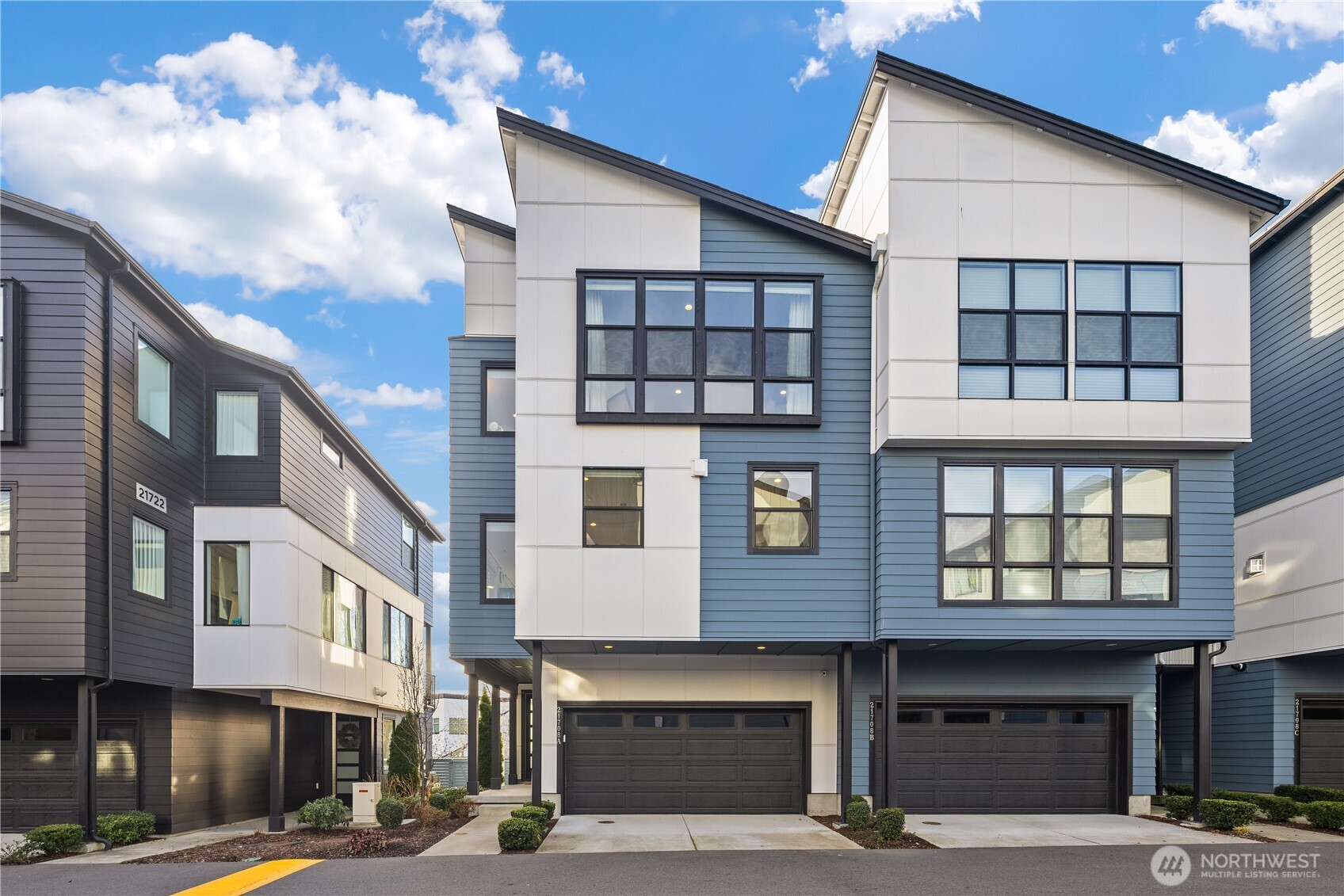 Tucked into the sought-after 220 Towns at Canyon Park, this end-unit townhome stands out for what buyers notice first- massive windows and incredible all-day natural light that fill the home from morning to evening. The tree-lined boulevard approach and proximity to the community’s expansive park create a welcoming, peaceful setting, while freeway access just minutes away keeps everything convenient.    Built by Toll Brothers and thoughtfully upgraded throughout, the popular Inglewood Elite floor plan offers 4 bedrooms and 3.5 baths with soaring 9-foot ceilings and a bright, open-concept great room centered around the fireplace. The gourmet kitchen and dining area flow seamlessly to a covered balcony, ideal for everyday living and entertaining.    The lower level features a private guest suite and access to the 2-car garage, while outside a fully fenced 'just big enough' yard provides the perfect space for a pup or gardening. Just steps from the large community park and located within the acclaimed Northshore School District, this home blends light, layout, location, and lifestyle in one of Bothell’s most desirable communities.