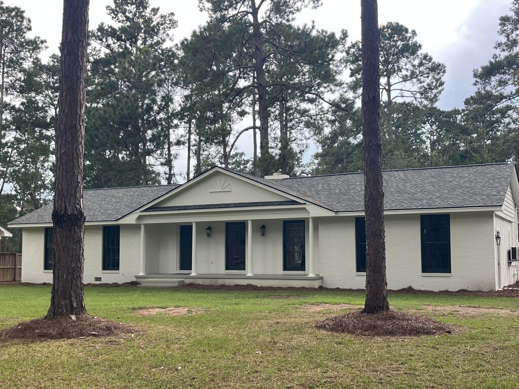 Completely Remodeled Brick Home in a Highly Sought-After Neighborhood!  Welcome home to this beautifully remodeled 3-bedroom, 2-bathroom brick home, where timeless charm meets modern convenience. Thoughtfully updated from top to bottom, this home is truly move-in ready and offers an exceptional combination of style, comfort, and quality.  The heart of the home features a completely updated kitchen with brand-new cabinetry, granite countertops, and all-new appliances, creating a beautiful and functional space for everyday living and entertaining. New vinyl plank flooring flows throughout the home, adding a fresh, modern feel. The spacious primary suite offers a beautifully renovated bathroom complete with double vanities and a seamless glass walk-in shower. The large guest bathroom is equally impressive, featuring double sinks and plenty of space for family or guests. Additional updates include a brand-new roof, tankless water heater, and all-new flooring and fixtures. A cozy fireplace adds warmth and character to the living space, while the classic brick exterior provides timeless curb appeal. Located in a highly sought-after neighborhood, this home combines the peace and appeal of an established community with the convenience of a completely updated interior. With nothing left to do but move in and enjoy, this is a home you won't want to miss!  Owner holds a salesperson license in the state of Georgia.