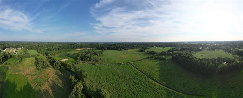 An amazing opportunity to own over 50 acres of gorgeous land with endless possibilities! Mature trees, a beautiful creek, and wide open spaces filled with nature.  Weather you're an avid hunter, farmer, or have been searching for a place to build your dream home--this property would be perfect for you and your plans! This listing includes two parcels: 33-16-16-35-200-015 & 33-16-16-35-200-004 Schedule your showing today! Current use is Hunting,Recreational.