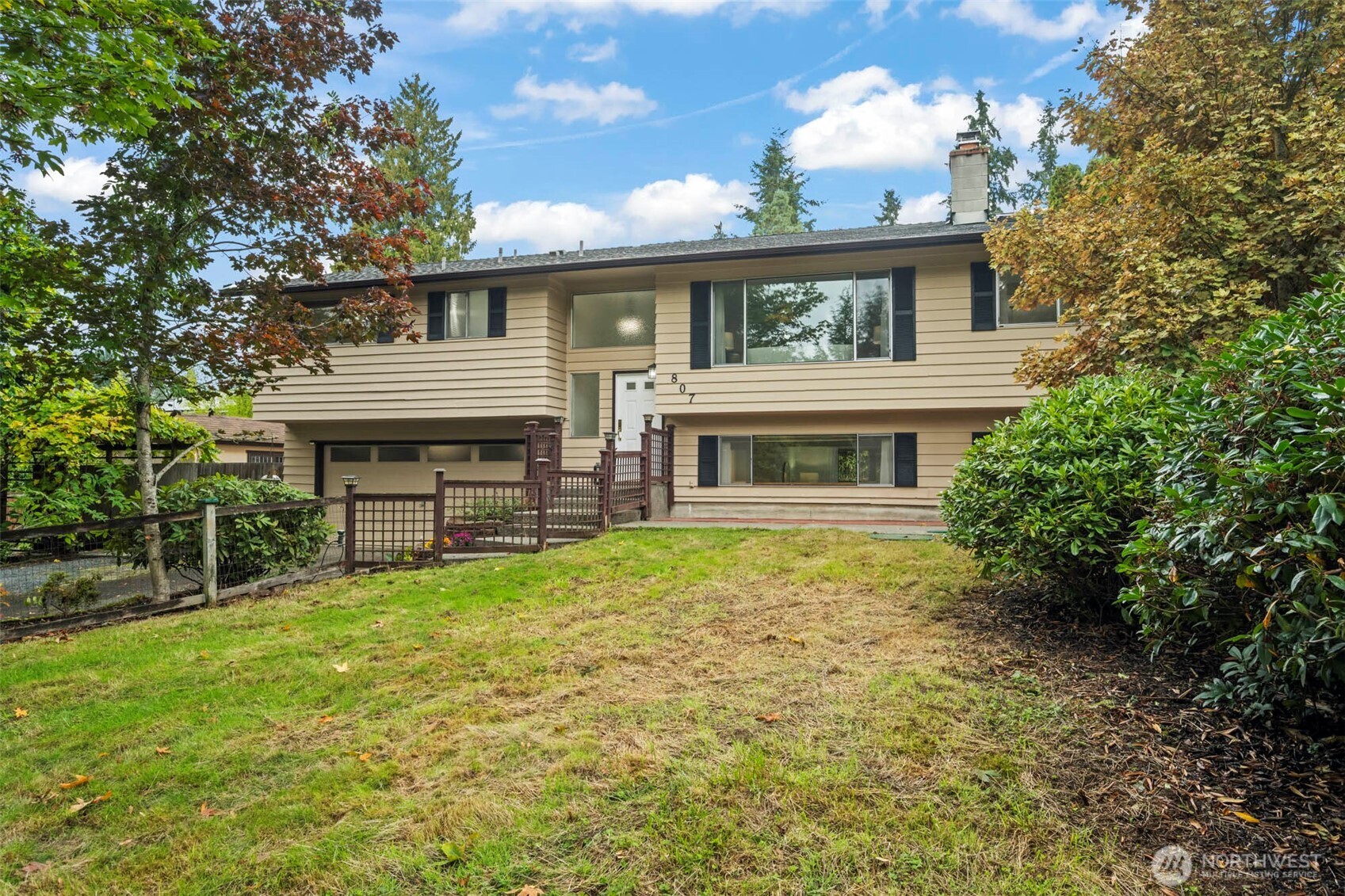 Beautifully updated home near Thrashers Corner! Spacious 3 bd/3 ba Bothell home offers comfortable living. Large kitchen w/eating space, expansive dining room, & a dedicated office. Cozy up to fireplaces on both levels. Updates incl new carpet, fresh interior paint, & modern lighting. The lower level features a generous family room, 1/2 bath, utility area, & add'l flex space, perfect for guests or hobbies. Step outside to entertain on the deck, overlooking an extra-large, fully fenced yard with storage shed & plenty of room for RV parking. Newer furnace, roof, washer, & dryer. All appliances stay! 2-car garage. No HOA. Set on a 17,860 sq. ft. lot--subdividable?? Located in the desirable Northshore School District.  Home is pre-inspected.