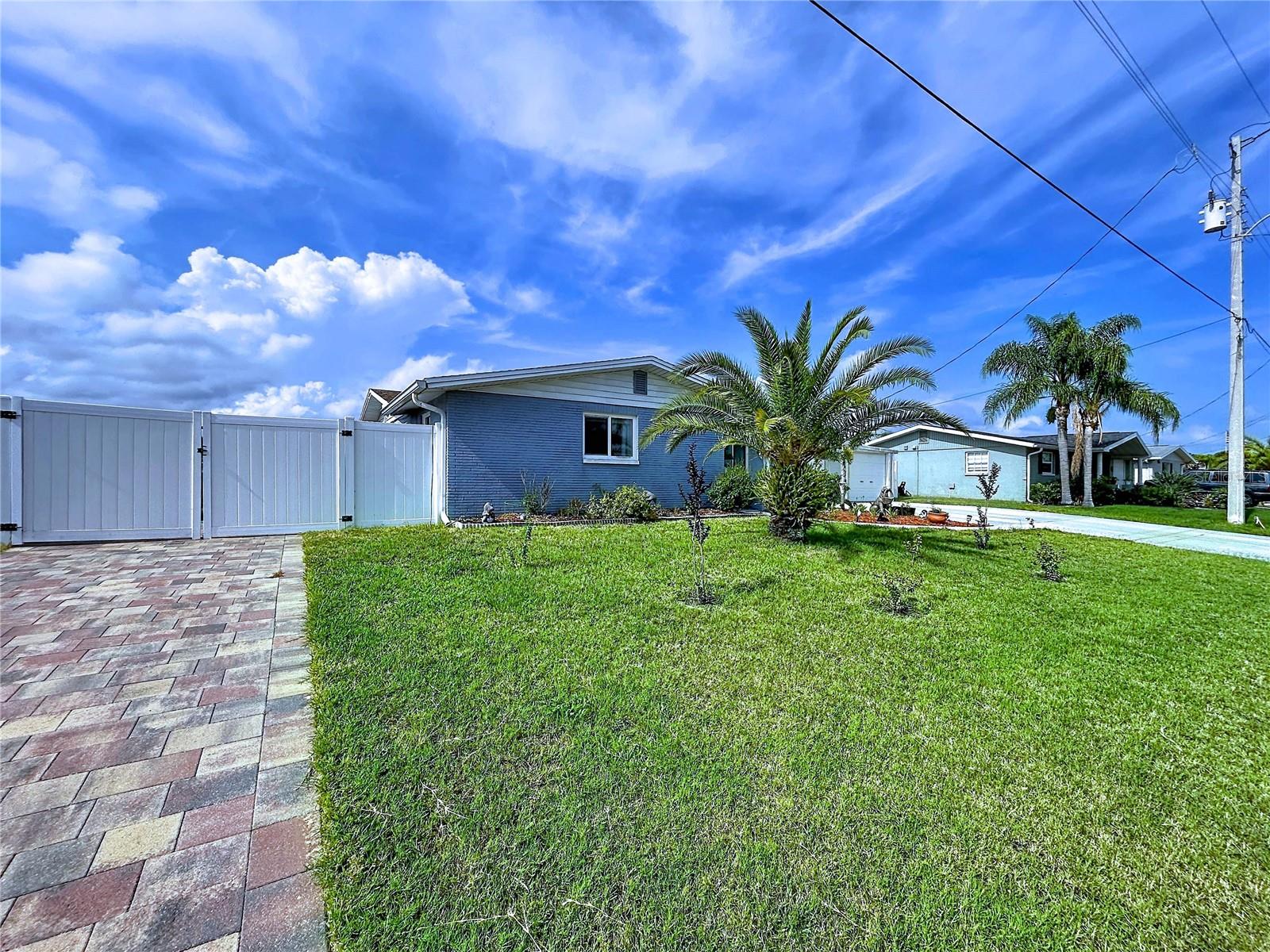 WATERFRONT LIVING WITH DIRECT GULF ACCESS! One of the standout features of this property is that the seller has already paid for the home's exterior to be professionally painted, giving the future owner the unique opportunity to select their own color and personalize the home's curb appeal before the work is completed. Additionally, the home is equipped with fully paid-off solar panels, allowing the next owner to enjoy the benefits of solar energy without assuming any solar loan or lease obligations.Welcome to 6536 Leeside Isle, a versatile waterfront home offering 3 bedrooms, 2 bathrooms, and a unique layout designed to accommodate a variety of lifestyles. Situated on a deep-water canal with direct access to the Gulf of Mexico, this property is a dream for boaters, anglers, and anyone looking to enjoy Florida's waterfront lifestyle.Inside, you'll find two full kitchens, creating an ideal setup for multi-generational living, extended family stays, guests, or flexible living arrangements. The thoughtful floor plan provides privacy and functionality while maintaining an inviting flow throughout the home.Step outside and discover your own private waterfront oasis. The beautiful pool offers the perfect place to relax and entertain, while the floating dock and dedicated boat storage area make getting out on the water effortless. Whether you're heading to the Gulf for a day of fishing, island hopping, or simply enjoying a sunset cruise, you'll appreciate having direct boating access right from your backyard.The outdoor living space is designed to take full advantage of the waterfront setting, providing plenty of room for entertaining family and friends, hosting poolside gatherings, or simply unwinding while enjoying the peaceful canal views.Conveniently located near waterfront restaurants, shopping, beaches, golf courses, and everyday amenities, this property offers the perfect combination of coastal living and practical convenience.Opportunities like this are hard to find—a waterfront home with Gulf access, a pool, floating dock, boat storage, two kitchens, and a layout suited for multi-generational living. Schedule your private showing today and experience everything this exceptional waterfront property has.