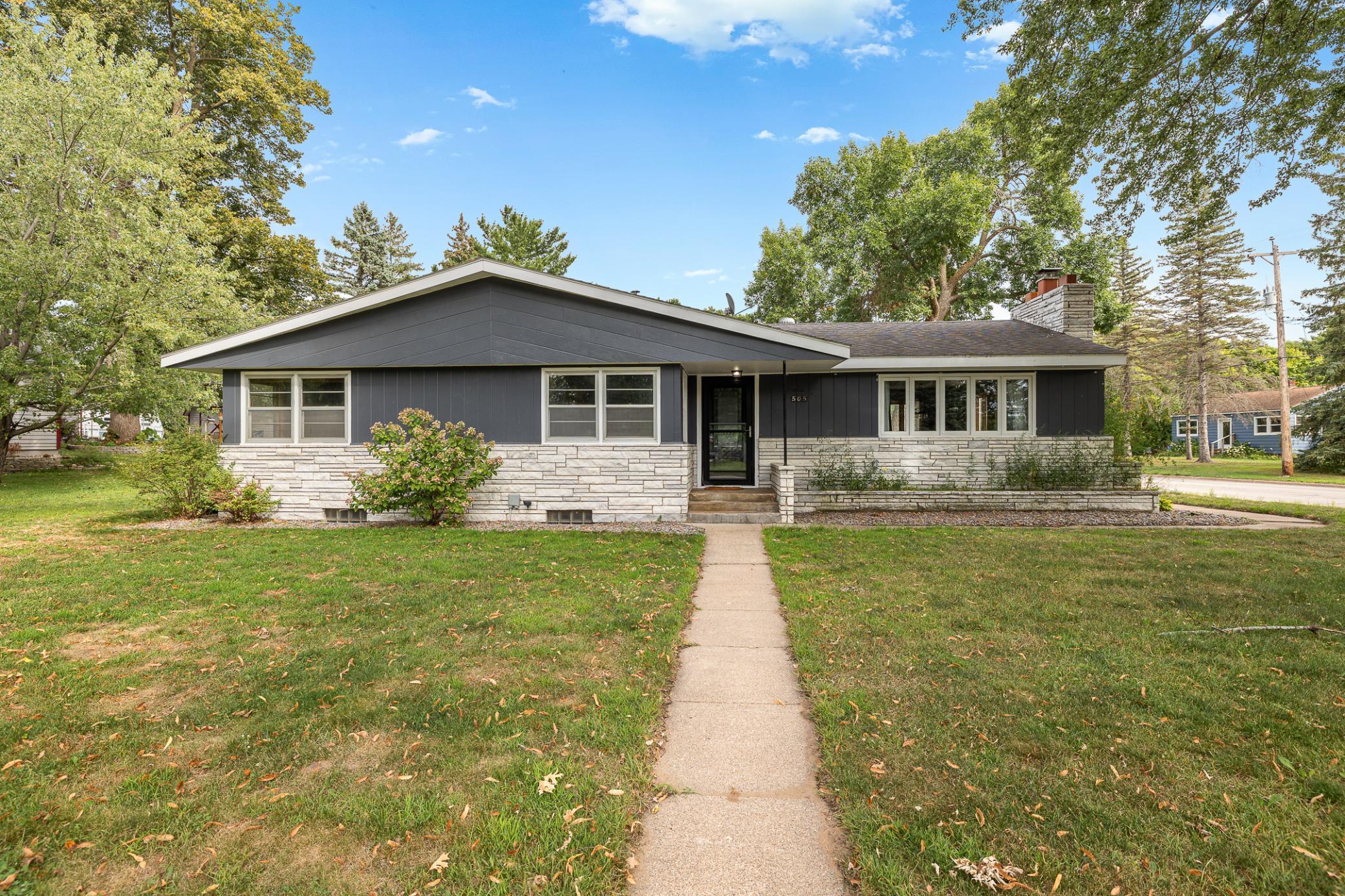 Meticulously maintained and move-in ready, this spacious home offers a great combination of comfort, quality and functionality. Inside you’ll find beautiful hardwood and slate flooring, granite countertops, oak cabinetry and stainless steel appliances. The inviting main level features generous room sizes, a large living room with a cozy fireplace, a primary suite and two additional bedrooms. The lower level adds even more living space with a 4th bedroom, large family room, half bath and storerage room. A new furnace was installed in spring 2025. Outside, the impressive 30' x 48' garage provides abundant storage and workspace, while the concrete driveway and additional parking pad offer plenty of room for an RV or recreational vehicles. Conveniently located near many everyday amenities!