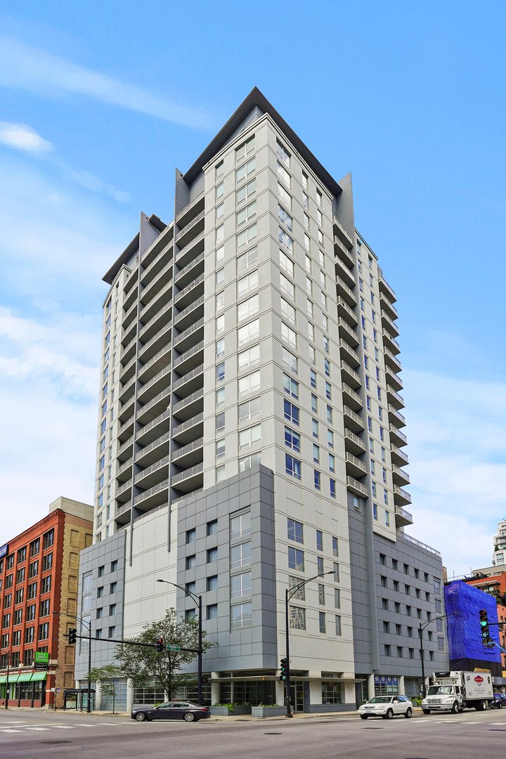 Contemporary living in the heart of vibrant River North! This stunning 2-bedroom, 2-bath residence in the 21-story boutique Grand Orleans offers a desirable split floorplan with spectacular east-facing city views.    The combined living and dining area boasts hardwood floors, floor-to-ceiling windows, and double doors opening to an expansive balcony. The kitchen features 42" white cabinetry, granite countertops, stainless steel appliances, a pantry, and a generous breakfast bar.    The spacious primary suite includes a large walk-in closet and a master bath with a soaking tub and separate shower. The guest bedroom is generously sized with a full bathroom just across the hall. Additional highlights include an in-unit washer/dryer and an extra storage cage. Garage parking available for $35,000.    Grand Orleans amenities include a 24-hour doorman, fitness center, on-site garage, and storage locker. Ideally located just steps from the Brown/Red Line trains, Jewel, Whole Foods, Trader Joe's, East Bank Club, restaurants, nightlife, dog parks, and easy highway access. No rental cap-investors welcome!    Take a 3D tour by clicking the 3D button to walk through this amazing home.