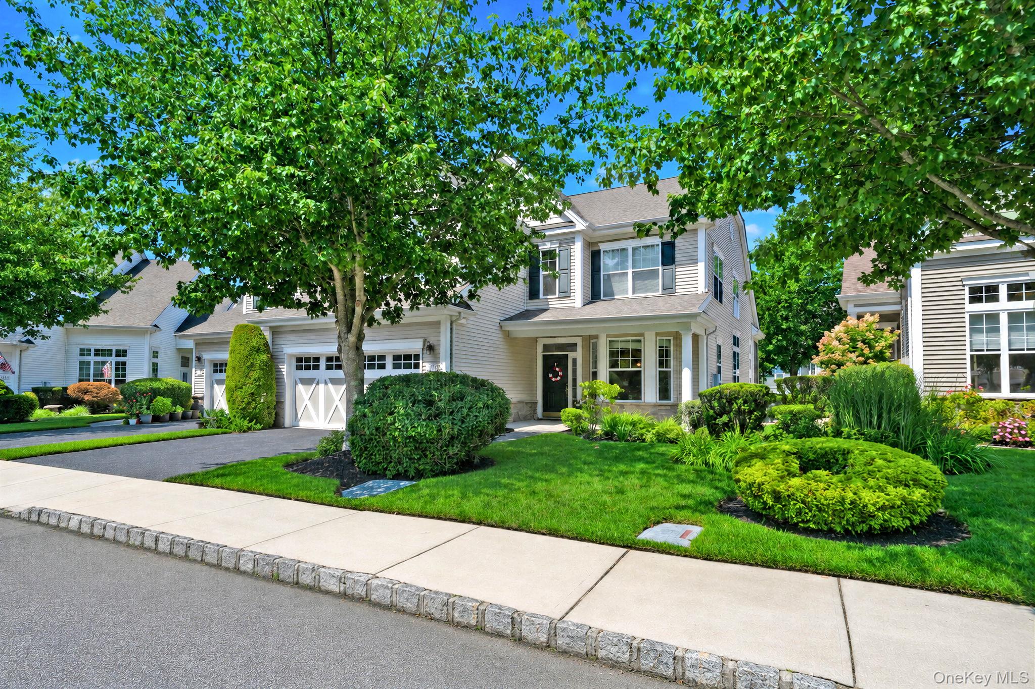 Welcome to Encore Atlantic Shores, a premier gated 55+ active adult community offering resort style living in the heart of Eastport. This spacious 2 bedroom, 2.5 bath Applause model offers a thoughtfully designed living space flowing through this desirable layout featuring a first floor primary suite with private bath, while the second bedroom and full bath are privately situated upstairs. Hardwood floors throughout the main living areas, complemented by an open living area, perfect for relaxing or entertaining. Additional highlights include natural gas heating, two zone central air, a two car attached garage, and a screened in sunroom on the rear patio. Chopin Pl is located on the east side of the community just a short walk from the pool, clubhouse and in a private cove with ample guest parking in close proximity. Residents enjoy an exceptional lifestyle centered around an impressive 11,800 square foot clubhouse, with indoor and outdoor pools, fitness center, spa, sauna, tennis, bocce, putting green, walking paths, billiards, card rooms, ballroom, and an active calendar of clubs and social events. Enjoy low maintenance living with outstanding amenities at Encore Atlantic Shores of Eastport.