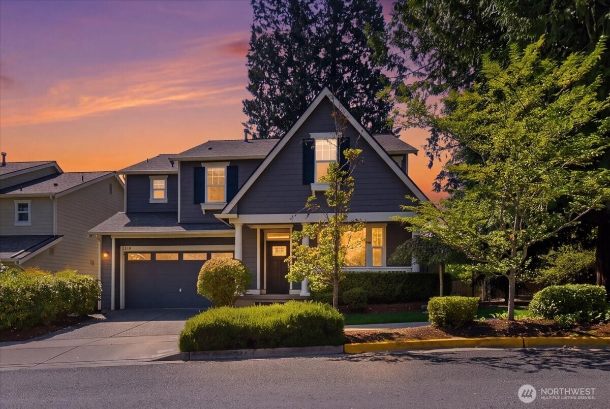 A North Redmond home that truly lives well! Located on a quiet street in the sought-after Woodlands neighborhood, this original-owner CamWest home offers 2,940 square feet of thoughtfully designed space, with room for everyone & flexibility for whatever comes next.  The main level welcomes you with an open, comfortable flow between the living, dining, kitchen, & family rooms—spacious enough to gather without feeling disconnected. A main-floor bedroom with closet offers flexibility as a guest room, home office, or den. Upstairs, the private primary suite features its own sitting area, perfect for a reading nook, workspace, or fitness space, along with 3 additional bedrooms, an oversized bonus room, & the convenience of a dedicated laundry room. Thoughtful updates make this home easy to enjoy, including remodeled kitchen counters & appliances, new main-floor wood flooring, heated tile floors in the primary bath, a newer roof & air conditioning. Step outside & discover your own private retreat. A covered front porch, extended back deck, enlarged patio, mature landscaping, & fully fenced backyard create multiple spaces for morning coffee, summer gatherings, play, or simply unwinding at the end of the day. A greenbelt along the west side adds an extra sense of privacy and connection to nature. Close to parks, trails, PCC, medical services, downtown Redmond, Woodinville, Kirkland/Totem Lake, SR 520, and the new Redmond train station. Served by excellent Lake Washington Schools.