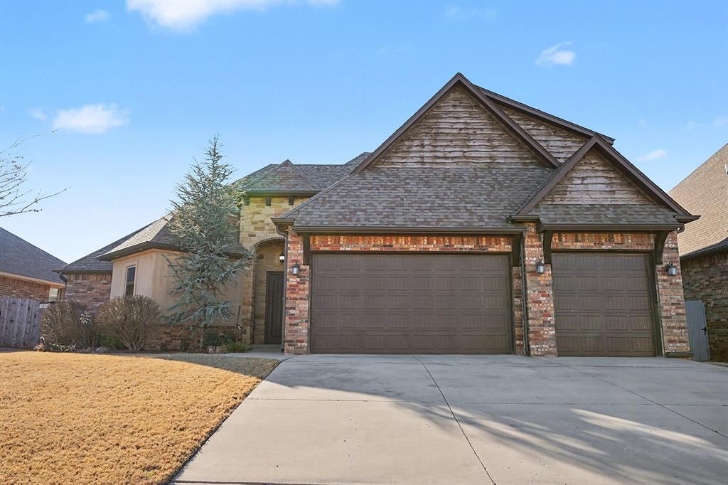 Welcome to your new haven, a stunning house redefining the meaning of Home Sweet Home! A vibrant neighborhood with manageable commutes to major shopping and restaurants in all directions! Major University, National Weather Center, City Parks, and Sam Noble in 10 minutes or less. Lake Thunderbird boat ramp is a quick 15 minute ride and 2 casinos in 20 or so minutes. This is a treasure trove property of features sure to inspire your imagination, your digital needs, or some silence to recharge. Entry is greeted with a study or 4th bed with a walk-in closet and a unique and charming stained wood accent wall. Feel the inviting open-concept living area bathed in an abundance of natural light! A cozy and commanding fireplace is framed by exquisite stonework and a quaint mantle! Channel your inner Chef skills in a sleek kitchen featuring stainless appliances to dazzle all with every meal prep. Expansive counter space invites culinary creativity, while ample storage options abound for all your kitchen gadgets. Dining area features gorgeous lighting and space to entertain! The hallway is blessed with custom enclaves to greet your visit to the primary bedroom! A barreled and wooded ceiling commands respect! Private patio access, multiple layout options, and additional space for reading or working will fit your style! En suite has dual vanities, framed mirror, powder area, darling soaker tub and an exquisite walk-around shower with rain head, body and wand sprayers! The huge walk-in closet includes built-in and laundry access! All guest beds with ceiling fans and generous closets. Guest bath also includes double vanities and shower-tub! Up to a 5th bed, bonus, or game room includes its own walk-in closet, a full bath, mini-split and layouts to handle DnD gatherings or team meetings! Beautifully landscaped yard and outdoor spaces are perfect to entertain or calming retreats. Built-in cooking options brings all the friends to the yard! Buy this home and exceed your expectations!