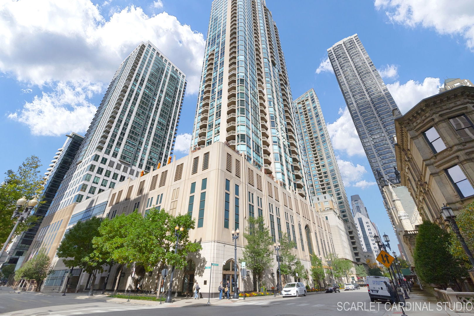 Unmatched LUXURY in the Heart of the Cathedral District. Welcome to an extraordinary PENTHOUSE RESIDENCE in the prestigious PINNACLE BUILDING-a half-floor home that blends sophisticated design with sweeping, unobstructed skyline views. This ONE-OF-A-KIND property offers TWO EXPANSIVE TERRACES AND A PRIVATE BALCONY, creating over 1,900 SQUARE FEET OF OUTDOOR LIVING SPACE, 43 floors above the city. A Grand First Impression as you enter through a gracious foyer with CUSTOM INLAY TILE and an elegant tray ceiling, setting the stage for the LIGHT FILLED, open-concept interiors. The dining and family rooms feature FLOOR-TO-CEILING WINDOWS, soaring 10' ceilings, and a GAS FIREPLACE. From here, step onto the sprawling 41' x 39' MAIN TERRACE-complete with IRRIGATION AND ELECTRICAL-ideal for an elevated garden retreat, private entertaining, or simply taking in the panoramic views. The PRIMARY BEDROOM is a sanctuary, featuring two walk-in closets and a spa-inspired ensuite with radiant heated floors, a heated towel rack, soaking tub, and walk-in shower. Direct access to the main terrace allows you to start and end your day surrounded by breathtaking views. The designer CHEF KITCHEN is equipped with sleek light-gray cabinetry, quartz countertops, and a large center island. HIGH-END APPLIANCES include a Wolf oven, Sub-Zero refrigerator, and Miele dishwasher. A sunny breakfast room and beverage bar with wine fridge provide casual elegance, while the SEMI-CIRCLE BALCONY offers a serene spot for morning coffee above the city. Two additional ensuite bedrooms, each with 10' ceilings and stunning views, ensure privacy and comfort. One suite opens directly to the 21' x 18' SECOND TERRACE, perfect for hosting guests or creating a private outdoor escape. Living at the Pinnacle means enjoying a wealth of world-class amenities. Residents have access to an indoor pool and whirlpool, fully renovated cardio and strength-training gyms, and relaxing steam and sauna rooms. An expansive outdoor sundeck is equipped with grills and a fire pit, perfect for gatherings under the city lights. For pet lovers, there's a PRIVATE DOG WALK AND PLAY AREA, while entertainment options include a theater room, a hospitality suite with terrace, and private wine lockers. Additional conveniences include bike storage, a personal storage room, and two deeded parking spaces, with the option to purchase a third. PRIME LOCATION-Just blocks from Northwestern Memorial Hospital, Northwestern Law & Medical School, Lurie Children's Hospital, Michigan Avenue shopping, Ohio Street Beach, and acclaimed dining. This penthouse delivers UNPARALLELED INDOOR-OUTDOOR LIVING in one of the city's most sought-after addresses. Opportunities like this are rare-experience the Pinnacle lifestyle today.