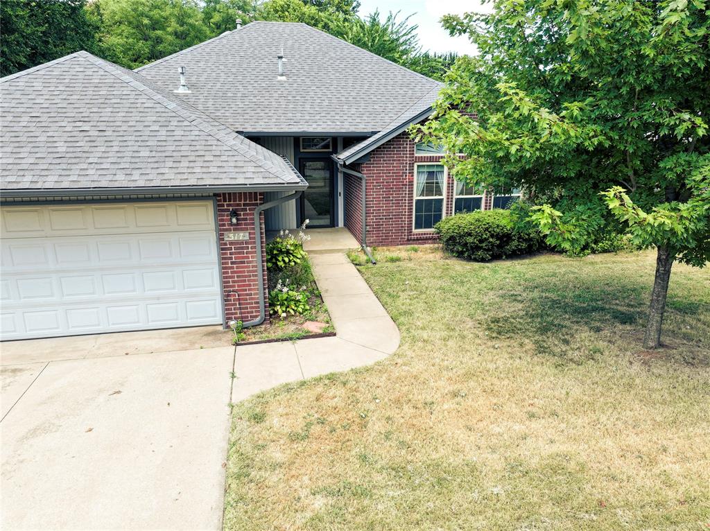 CHARMING TRADITIONAL BRICK HOME IN EAGLE CLIFF NEIGHBORHOOD!
WELL MAINTAINED AMAZING BACKYARD! 
Open split concept features high ceilings, floor to ceiling windows, beautiful wood flooring and a cozy masonry fireplace in the spacious living room, ideal for every day living and gatherings.
The kitchen with ample cabinetry, pantry space and modern built in appliances, flowing seamlessly into adjacent dining and living areas.
Enjoy the comfort of the primary bedroom,  high ceilings  access to patio for a morning coffee, the room also offers in suite bathroom with double separate  vanities, his and her closet , shower and bathtub.
Two more bedrooms offer comfortable and functional living which include nice size closets and share a full bathroom.
Step outside and you’ll find a beautiful covered patio perfect for lounging or weekend cookouts with a nice view to backyard with beautiful mature landscaping.
Need storage ? Two sheds  15.2x18.2. &  9.2x11.2  all your tools, hobbies or extra storage needs- plus plenty of room to garden, play or relax.
Walking distance to neighborhood park, close to shopping and schools.
This home blends comfort, convinience and charm- ready for you to move in and make it your own!