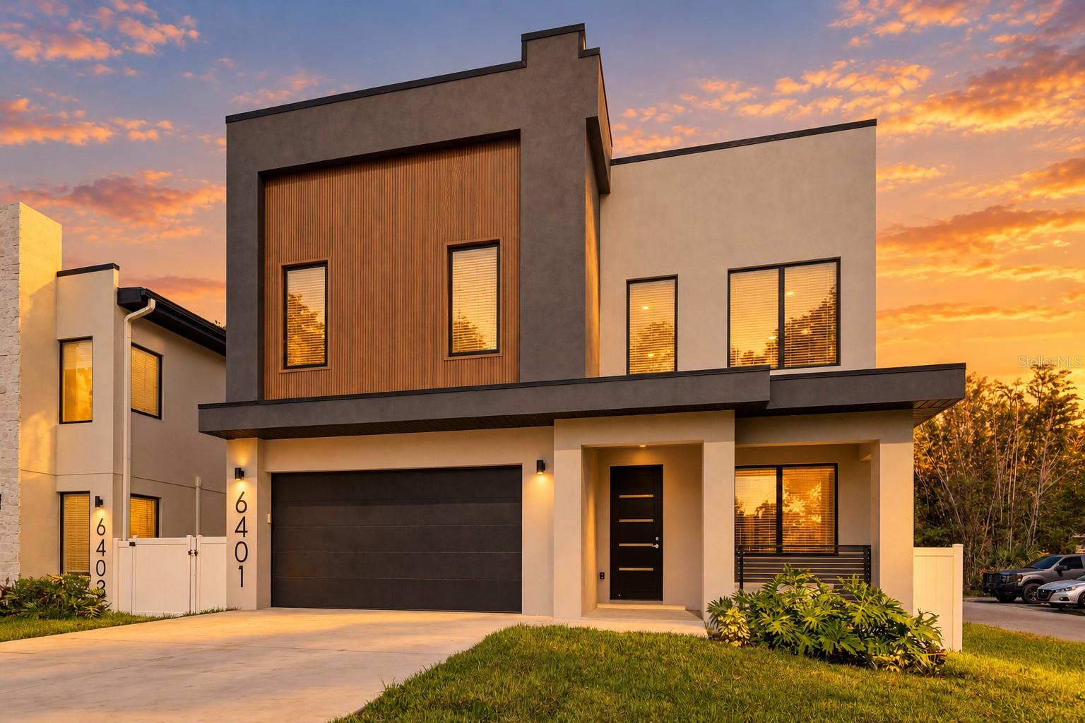 MOVE-IN READY • MODERN NEW CONSTRUCTION • SPECIAL BUILDER FINANCING AVAILABLE—including an exclusive 10-year interest-only option for qualified buyers. Ask how this opportunity could provide substantially lower initial monthly payments while preserving cash and purchasing power. Warm contemporary design and exceptional craftsmanship define this newly completed South Tampa residence by SALT & PEPPER CONSTRUCTION. Offering 4 bedrooms, 4.5 bathrooms, 3,125 square feet of living space and more than 4,000 square feet under roof, this home pairs clean architectural lines with warm natural finishes and thoughtfully designed spaces. Located in Sun Bay South just south of Gandy Boulevard, the home provides outstanding access to Downtown Tampa, Water Street, Westshore, Tampa International Airport, MacDill Air Force Base, waterfront parks, marinas and some of Tampa’s favorite restaurants. The property is located in Flood Zone X-500 and constructed above the base flood elevation for added peace of mind. Inside, soaring 10-foot ceilings, light oak flooring, designer lighting and abundant natural light create an inviting sense of scale. The chef-inspired kitchen features custom slow-close cabinetry, quartz countertops, an oversized island, premium stainless steel appliances and a hidden walk-in pantry. Expansive sliding doors connect the great room to a covered lanai already equipped with plumbing and electric for a future outdoor kitchen. Upstairs, the primary suite feels like a private retreat with an oversized custom closet and spa-inspired bath featuring dual vanities, a freestanding soaking tub and an impressive walk-in shower. Every secondary bedroom includes its own en-suite bath, while a spacious bonus room offers flexibility for a media room, office, gym or playroom. Built for lasting quality and modern Florida living, the home features concrete-block construction, impact-rated windows and doors, hurricane-conscious construction, a fully fenced backyard and extensive storage. A comprehensive builder warranty includes 2-year systems coverage and a 10-year structural warranty through the nationally recognized 2-10 Home Buyers Warranty program. This is more than a beautiful new home—it is an opportunity to secure sophisticated South Tampa living with a truly distinctive financing advantage. Schedule your private tour and ask for a personalized comparison of the available builder financing options. A neighboring sister residence at 6403 S. Richard Avenue, featuring a similar floor plan and design aesthetic, is also available to tour by appointment.