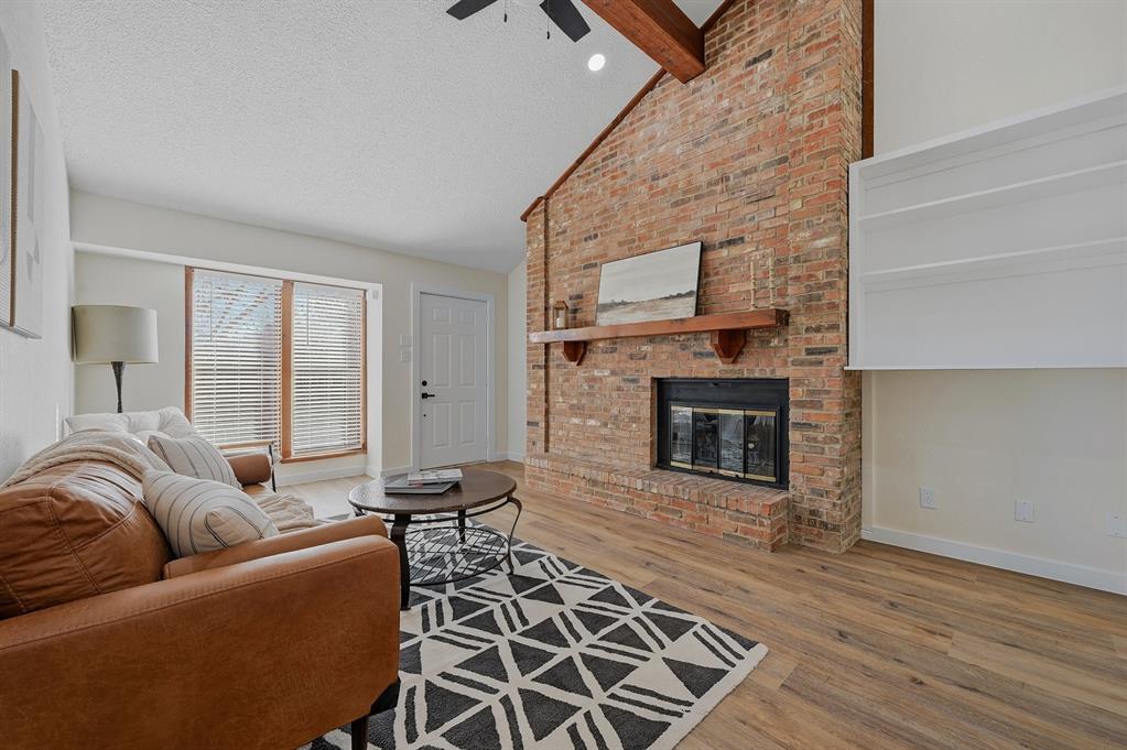 WELCOME TO THIS MOVE-IN READY TOWNHOME IN THE SOUGHT-AFTER SHADY RIDGE COMMUNITY!Tucked behind a private gated entry, this beautifully maintained home offers a rare combination of comfort, updates, and location. The fenced courtyard provides a quiet outdoor retreat and sets the tone for what’s inside.Recent improvements include luxury vinyl plank flooring, stainless steel appliances, an updated backsplash, and a fresh, neutral color palette throughout. The brick wood-burning fireplace adds character and warmth, creating an inviting space ideal for everyday living or entertaining.Several homes in the community have enhanced their layouts with an added loft or second bedroom, presenting future potential for expanded living space. Residents also enjoy access to a refreshing community pool, while the HOA conveniently covers water, sewer, and trash.Located in the center of the DFW Metroplex, this property offers easy access to shopping, dining, and major highways. Just steps away, the Bedford YMCA features walking trails, green space, a pond, disc golf, and more—making this an exceptional place to call home.Schedule your showing today—this one is a standout!