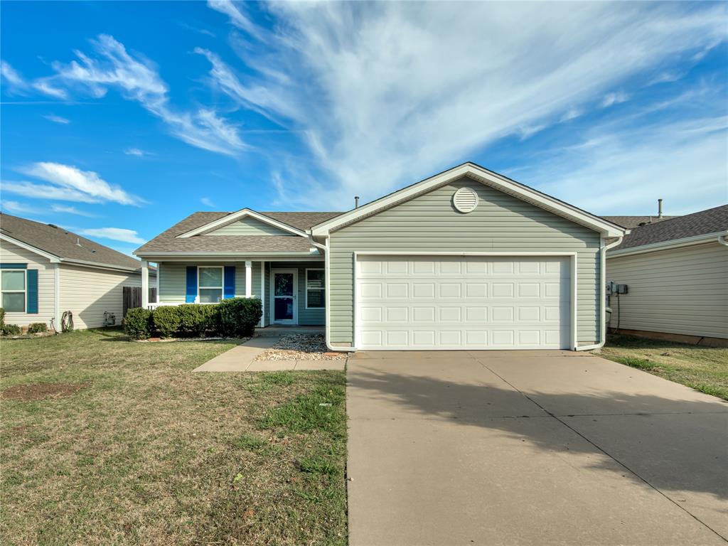 Adorable and affordable three-bedroom home located in Poppy Grove, within walking distance to Norman North High School! Built with energy-efficiency in mind, this home offers an open living/dining layout that is great for entertaining bigger gatherings. Walk in and find your tiled dining space and kitchen to the right, with a breakfast bar for extra casual dining, clean appliances, and stained wood cabinetry! The living space is filled with natural lighting from numerous windows! Plus, blinds are already installed for your privacy! Outside, you enjoy the beautiful day on the nice-sized covered front porch or create a backyard oasis starting with a large open concrete patio and fully fenced yard!