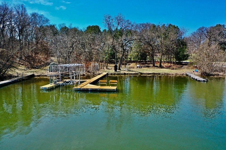 Here’s your chance to own 1.75 acres of recreational land with approximately 148 feet of shoreline on beautiful Eagle Lake! Whether you're into fishing, boating, ice fishing, or just relaxing by the water, this lot offers year-round enjoyment. Power is already on site, and docks are negotiable. Eagle Lake is known for its excellent fishing and water sports. Please note: It is currently uncertain whether the lot is buildable. Buyer and/or buyer’s agent to verify all building requirements with the city/county. This property is ideal for recreational use, such as camping, lake access, and storage of water toys. Don't miss this rare opportunity to enjoy affordable lake access in a peaceful, private setting! Additional property with house is available for purchase – 19009 236th Ave