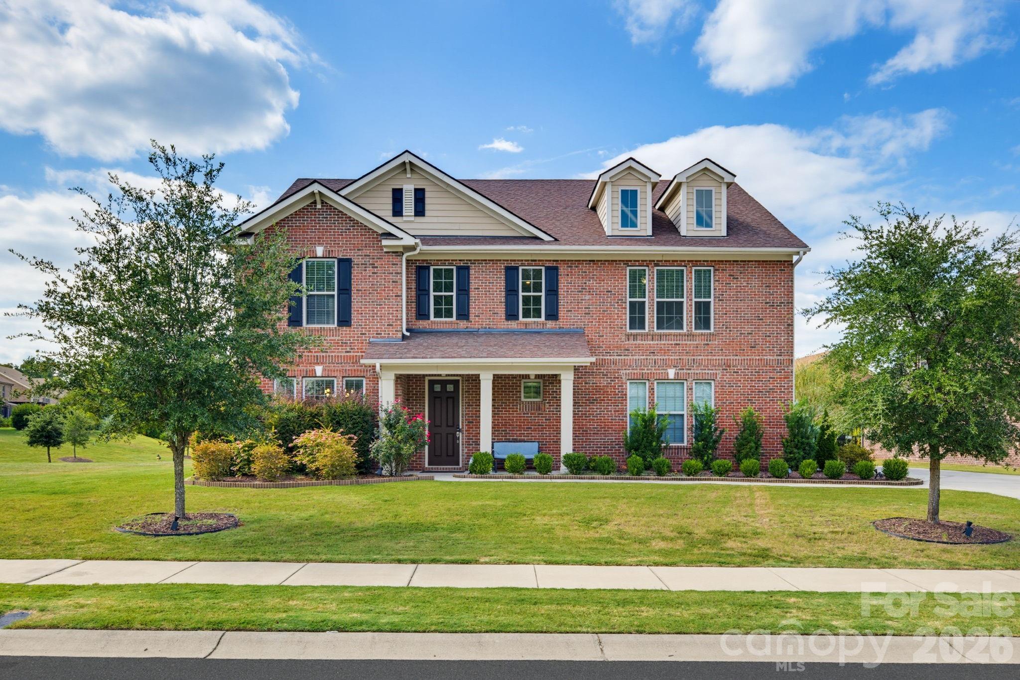 Welcome to 8315 Breton Way in Churchill Farms! This spacious northwest-facing 5-bedroom, 4.5-bath home offers approximately 3,864 square feet across two levels, including a main-level bedroom and full bath. The floor plan features a dedicated dining room, expansive living room with fireplace, kitchen with island and walk-in pantry, breakfast area, and an impressive upper-level primary suite with an oversized walk-in closet. A large upstairs sitting room provides additional flexible living space. Outside, enjoy a covered front porch, expansive rear patio, and fully fenced backyard on a level corner lot. Churchill Farms offers community amenities including a pool, playground, cabana, walking paths, picnic areas, ponds, and street lights.