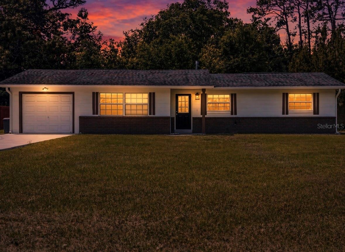 NEW ROOF! Discover this beautifully fully renovated 3-bedroom, 2-bathroom single-family home situated on a generous 0.37-acre lot with no HOA, right in the heart of Ocala. This move-in-ready property combines modern upgrades with everyday comfort, offering the perfect blend of style and functionality. From the moment you arrive, you’ll notice the freshly painted exterior and brand-new concrete driveway, creating clean curb appeal. Inside, the home features new luxury vinyl plank (LVP) flooring throughout—completely carpet-free—along with fresh interior paint that gives the entire space a bright, updated feel. The fully renovated kitchen is a standout, showcasing brand-new, never-used stainless steel appliances, modern finishes, and a layout designed for both cooking and entertaining. Both bathrooms have been thoughtfully updated with new vanities, showers, and a tub, delivering a sleek and contemporary look. The home offers spacious bedrooms with plenty of natural light, while the large backyard provides endless possibilities—whether you’re looking to entertain, garden, or simply relax in your own private outdoor space. Additional upgrades include a single-car garage with durable epoxy flooring, along with new light fixtures and ceiling fans throughout the home, adding both style and efficiency. Conveniently located just minutes from downtown Ocala and the World Equestrian Center, this property offers the rare combination of modern upgrades, space, and freedom with no HOA restrictions. A true turnkey opportunity you won’t want to miss. New roof to be installed prior to closing. Water softener included. Brand new Washer and Dryer included.