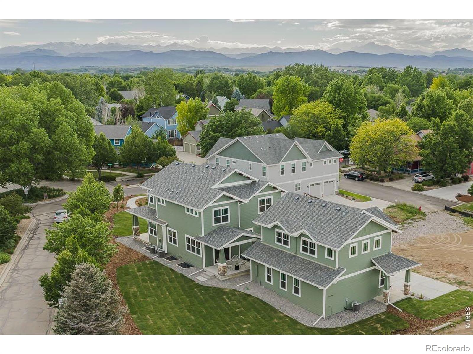 Just completed and move-in ready in highly sought-after Erie Village! Crafted by renowned Porchfront Homes, this 3 bed/3 bath exceptional property blends classic craftsman charm with elevated modern interiors including a beautifully finished 1-bedroom, 1-bath, 800 SF ADU above the detached oversized 810 SF garage. The main home showcases timeless finishes throughout, including shaker cherry cabinetry, luminous Calacatta quartz counters, designer plumbing and lighting fixtures, tasteful tile selections and white oak flooring. The gourmet kitchen is a true centerpiece with a Verona stainless steel 6-burner dual fuel range, stainless steel farmhouse sink and spacious walk-in pantry. Open kitchen, living and dining spaces are enhanced by 10' ceilings, a cozy gas fireplace and seamless connection to the covered patio, fully landscaped yard and fenced outdoor living space. The luxury primary suite is a spa-like retreat with vaulted ceilings, French doors to a private covered balcony, a grand walk-in closet, freestanding tub, spacious walk-in shower and double vanities accessed by a stylish barn door. Two additional upper-level bedrooms share a full hall bath, while the convenient upper laundry room offers cabinetry and folding space. A full unfinished basement provides room to grow. The oversized detached garage offers incredible flexibility for vehicles, storage, projects or workshop space. Above it, the newly completed ADU features the same high-end finishes, a full kitchen/living area, 1 bedroom, 1 bath, a large walk-in closet and washer/dryer hookups, ideal for guests, extended household needs, a private office or income potential.A true Erie Village gem combining classic beauty, modern comfort and rare additional living space in one of the area's most cherished neighborhoods. enclosed fence to be installed 7/20
