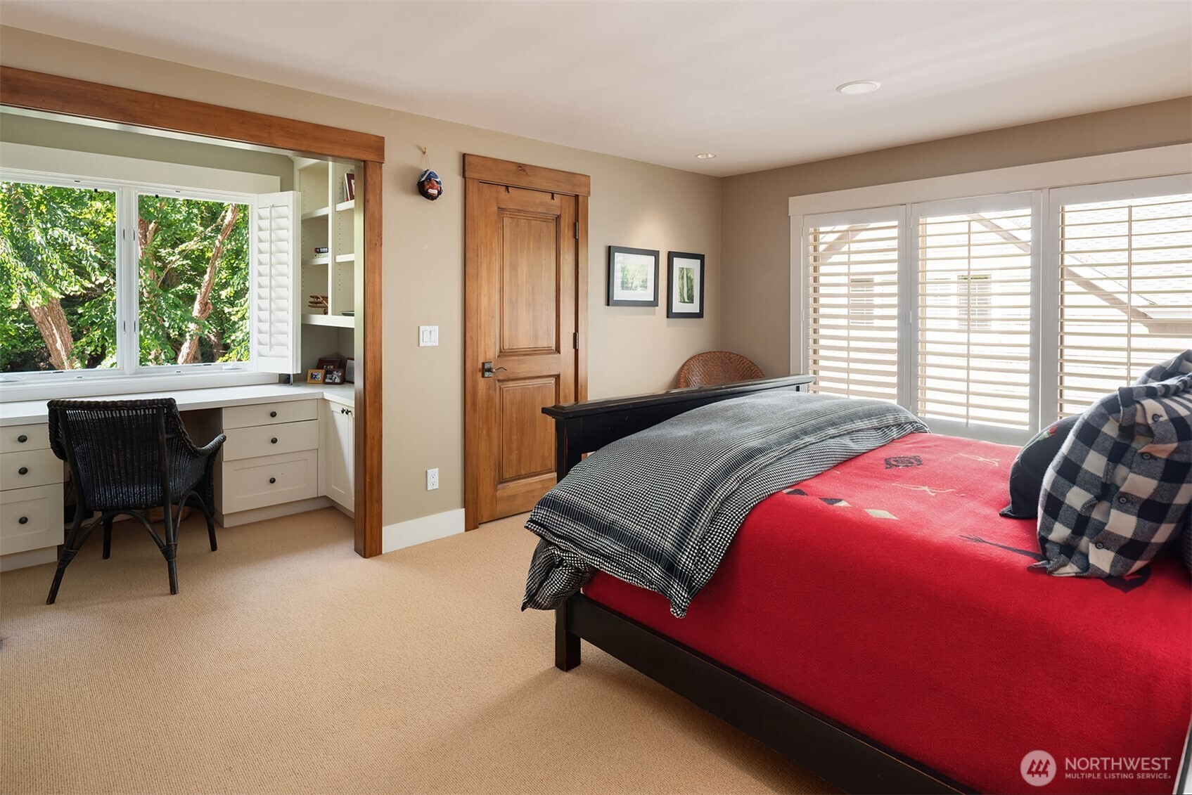 Bedroom with built-in desk area