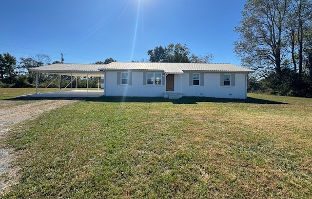 Beautifully remodeled 4 bedroom/ 2 bath home situated on 2 acres offers a modern open concept creating a spacious and welcoming atmosphere. Master offers a sleek tiled shower and double vanities. Home features LVP and tile floors throughout, butcher block counter tops in the kitchen, farm style sink, in-ground pool with pool house, and a 2 car carport. Convenient to Fayetteville and Huntsville.