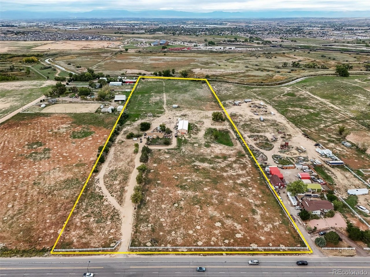 This rare multifaceted 20 acre property in unicorporated Adams County zoned A-3 is ideal for investors, potential development, or a family compound. This is a great opportunity to buy and hold or develop in an area being developed close to Reunion and Buffalo Run Golf Course. Backing to O'Brian Canal and Commerce City Municipal land, the fully fenced property includes a single family house with a domestic well, an irrigation well, septic, and a 6000 square foot pole barn (with a concrete floor, 2 overhead doors, and a man door). Located in a private area, the property is also in close proximity to I-76, DIA, and E-470. Call Listing Agent regarding future zoning and current zoning usage, or Adams County Planning and Zoning at 720.523.6800.