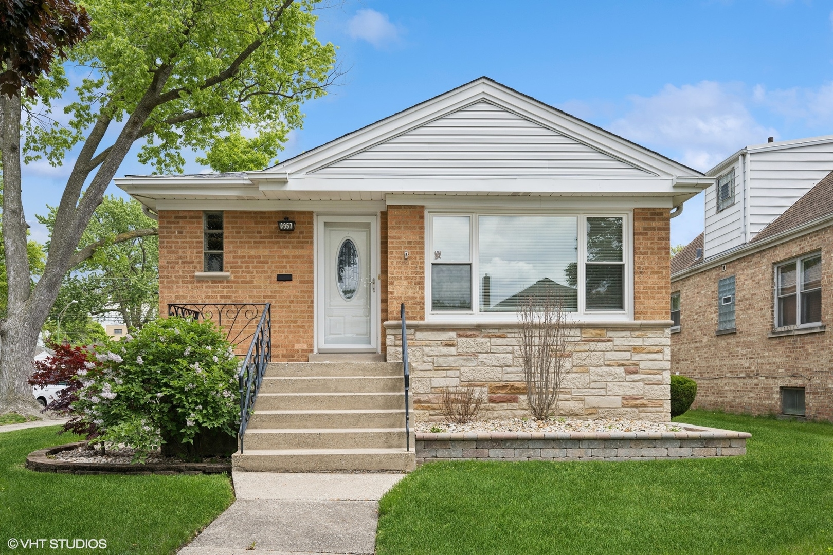 Welcome to 4957 North Meade Avenue in Jefferson Park! This charming bungalow on an extra-wide corner lot offers 3 bedrooms and 2 updated bathrooms. Stunning home features include hardwood floors, a 2012 remodeled kitchen with a GE 4-griddle stove/oven, LG microwave, and Kenmore French door refrigerator, plus ample pantry storage. Wonderful  full basement with full side by side laundry, plenty storage space, second family room, utility space and full bathroom. The exterior boasts a new garage floor, power-washed front porch, 6-year-old back porch, patio, and lush landscaping with river rock. Recent updates include newer windows, tuckpointing, and a 10-year-old garage roof and siding.  This move-in-ready gem is perfect for enjoying a vibrant neighborhood and comfortable living.