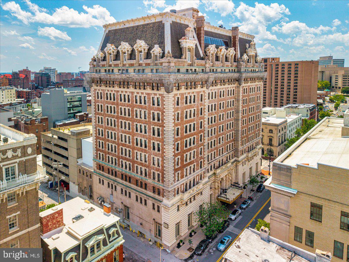 **Charming Condo in Baltimore’s Crown Jewel in the Heart of Mount Vernon, Baltimore City**Discover the allure of city living in this exquisite condo situated within the historic and elegant Belvedere Hotel, nestled in the vibrant Mount Vernon neighborhood of Baltimore City. This secure building offers peace of mind with 24 hour front desk personnel and VIP elevator for residents only, ensuring a safe and welcoming environment for all residents.Enjoy exclusive access to resident-only floors through key fob entry, enhancing your privacy and convenience. The Belvedere also boasts an array of amenities, including the renowned Owl Bar Restaurant and a deli, catering to your culinary desires right at your doorstep. For added convenience, medical, dental, and legal services are available within the building, making daily life effortless.Located just a stone's throw away from esteemed institutions such as Johns Hopkins, Mercy, and Maryland General Hospitals, this condo is perfect for healthcare professionals or anyone seeking proximity to these facilities. Commuters will appreciate the convenience of the Amtrak Station and MARC train services, both within a mere three blocks. Additionally, cultural hotspots like the University of Baltimore, the Maryland Institute College of Art (MICA), and the Peabody Conservatory are all within walking distance, offering a rich tapestry of educational and artistic opportunities.Step inside this sun-drenched 10th-floor unit and be captivated by its breathtaking views. The spacious layout features neutral paint tones and luxurious vinyl flooring, providing a modern yet timeless aesthetic. The completely refurbished kitchen is a chef's dream, showcasing all-new appliances, elegant real wood butcher block countertops, and a stylish subway tile backsplash that adds a touch of sophistication.The building's architecture rivals that of the iconic Plaza Hotel in New York City, and as you enter the magnificent marble lobby, you will be transported back in time. The ambiance is enhanced by new recessed lighting throughout the unit, creating a warm and inviting atmosphere.The updated bathroom offers contemporary fixtures and finishes, ensuring comfort and style. This condo epitomizes efficient living, combining modern conveniences with classic charm, making it an ideal choice for those seeking a low-maintenance lifestyle without sacrificing elegance.Don't miss your chance to own a piece of history in one of Baltimore's most desirable neighborhoods. Whether you're a first-time homebuyer, a busy professional, or an investor looking for a prime rental opportunity, this condo is a must-see. Experience urban living at its finest in this stunning Mount Vernon gem!Owner Financing Available for Qualified Buyers.