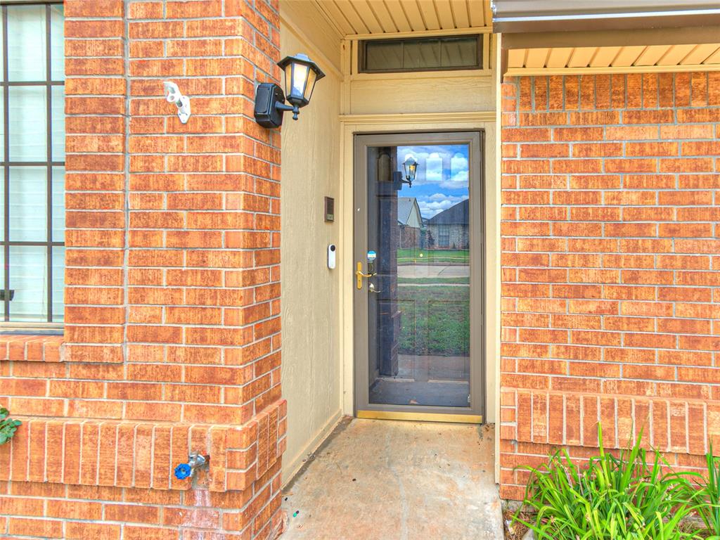 4-bedroom, 2.5-bath home in a convenient location near Moore schools, shopping, dining, parks, and major highway access. This two-story home offers a functional layout with the primary suite on the main level and three additional bedrooms upstairs. The living room features a fireplace and open sight lines into the dining area, creating a comfortable space for everyday living and entertaining. The kitchen showcases attractive navy blue cabinetry, and pantry, and convenient access to the laundry room. A half bath is located near the front entry for guests. The primary suite includes dual vanities, a jetted tub, and a sliding patio door providing direct access to the backyard pergola. Upstairs, you’ll find three bedrooms and a full bath with a recently updated shower. Outdoor living shines with a covered patio, extended concrete patio, pergola, and storage shed. The attached two-car garage includes a built-in storm shelter for added peace of mind. Recent improvements include HVAC systems replaced in 2023, a stainless steel dishwasher installed in 2024, updated lighting and ceiling fans, and a Ring doorbell that remains with the home. New roof in 2024. Move-in ready and designed for comfortable living.
