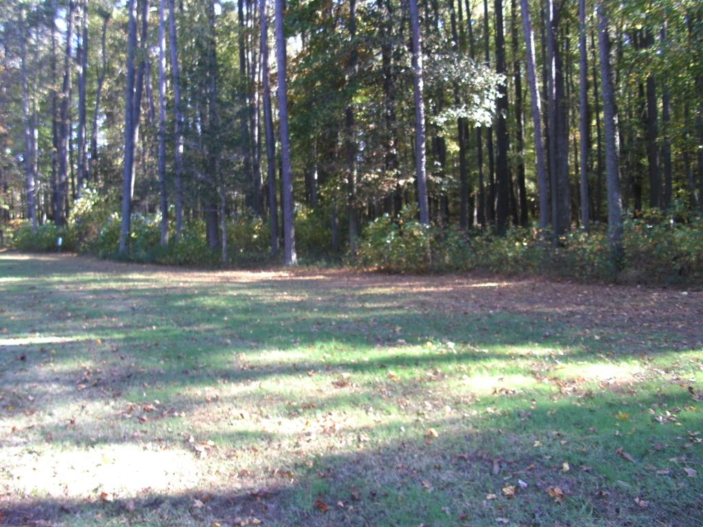 Looking for a large lot in a gated community?  Now's your chance to own over 5 acres located in prestigious Corbin Hall. Plenty of room to build your dream home in this upscale community with amenities galore. There is a new Marina that features 25 new boat slips, boat ramp, community dock. Beautiful Community Center, exercise room, Pool and Hot Tub. Come see the other side of Chincoteague Bay!