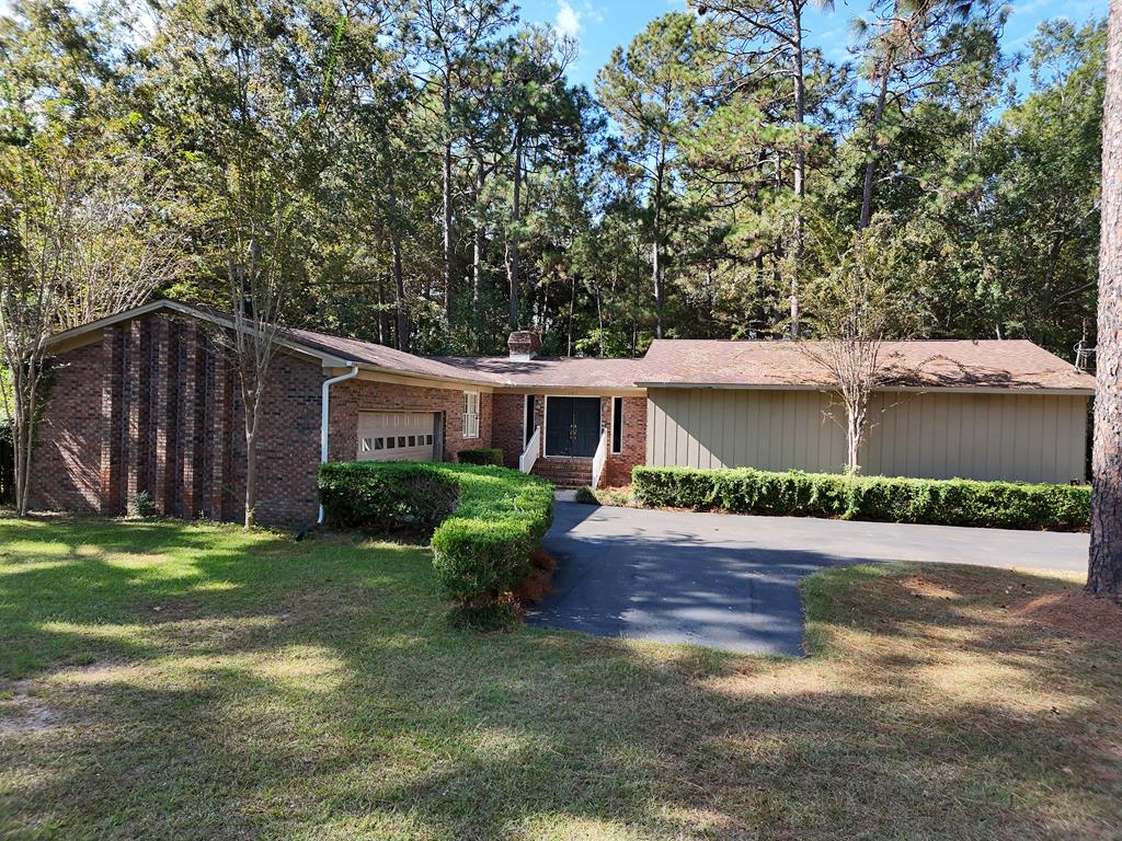 Location! Location! Location! Haven't heard that rule in a while! This home is just that, Located on south side of Thomasville, near Brookwood School. Features double door entryinto a foyer that leads to a charming 3 bedroom 2 bath home. Features are large kitchen, formal dining room, large den with fireplace, custom wood floors (seems to be a thing of the past) , french doors leading to a private wooded backyard. Nice brick patio for entertaining. Make a appointment soon, won'tlast long.