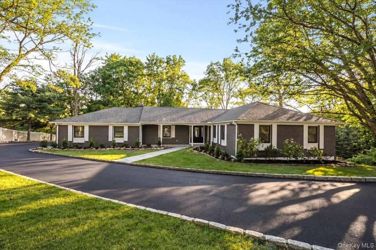 Welcome to 11 Skyview Drive in Armonk, New York—a fully gut-renovated single-family ranch that seamlessly blends modern luxury with everyday comfort. This stunning 3-bedroom, 3 full bathroom home showcases high-end finishes throughout, including beautiful white oak hardwood floors that flow effortlessly across the entire main level. The heart of the home is a designer kitchen featuring sleek quartz countertops, a striking double waterfall island, and light natural wood cabinetry that creates a warm yet contemporary feel.Designed with both convenience and innovation in mind, this home is a fully integrated smart home equipped with built-in speakers, security cameras throughout the property, and thoughtful upgrades like heated floors in the primary bathroom. The spacious layout continues into the finished basement, offering an additional versatile room perfect for a home office, guest suite, or au pair space. For added relaxation, enjoy your very own in-home sauna—bringing a true spa-like experience right to your doorstep.Major systems have all been updated, including a brand-new central heating and air conditioning system with forced air, an above-ground oil tank for heating, and an electric stove setup. The home is serviced by a drilled well and septic system. Step outside to enjoy a brand-new deck overlooking the property, along with a newly paved driveway and a 2-car garage. Two charming wood-burning fireplaces add warmth and character to the living spaces.Located in the highly desirable Armonk area, this home offers close proximity to local shops, restaurants, parks, and top-rated schools, while still providing a peaceful suburban setting. With easy access to major roadways and nearby towns, 11 Skyview Drive presents a rare opportunity to own a turnkey, modern home in one of Westchester County’s most sought-after communities.