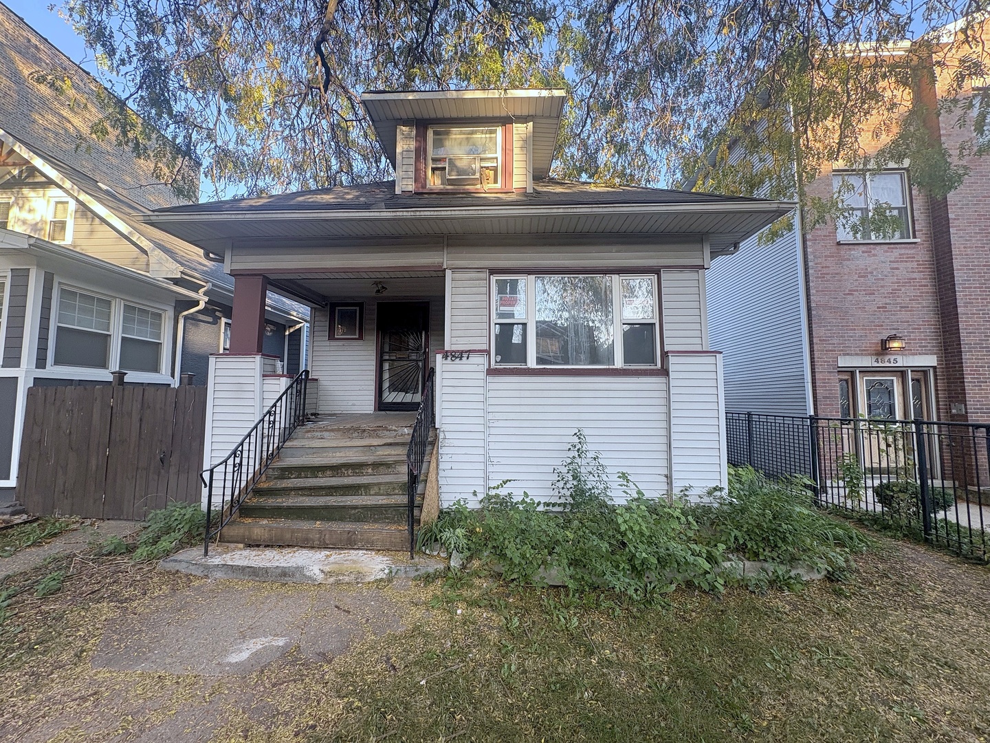 Opportunity knocks in Albany Park! This classic 1921 Chicago bungalow is waiting for its next chapter, and it could be yours. Investors, here's your next fix-and-flip. Homeowners, here's your chance to rehab a house into the home you've always pictured. Hardwood floors, ceiling fans, a kitchen, a full bath, a finished attic with bedrooms, and a full basement with laundry give you a solid start. Outside are a rear deck, a yard and a detached 2-car garage. Dreaming bigger?     It sits on a 32x124 lot zoned RT-4, with potential for a multi-unit new construction project. It's about 0.6 mi to the Kimball Brown Line and close to Eugene Field Park and the shops and restaurants along Lawrence and Pulaski. Rehab it, flip it, build it or make it home. Opportunities like this don't wait, so act fast! Sold as-is.