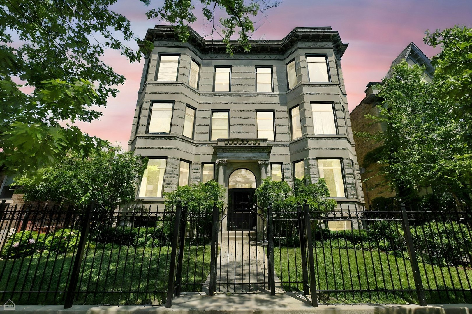 Welcome to this exceptional custom renovation top-floor 3-bedroom Penthouse nestled within a beautifully maintained Chicago Greystone building, perfectly positioned just steps from the vibrant Southport Corridor & Located in the heart of Graceland West!  Designed for those who appreciate both luxury and vintage, this expansive 3-bedroom, 2-bath residence offers a harmonious blend of classic architectural charm and modern sophistication.  Upon entering, you're greeted by an impressive open floor plan encompassing approximately 1,500 square feet. The living space is adorned with exposed brick, soaring 10-foot ceilings, custom wainscoting, and elegant crown molding that evoke a sense of timeless style.  Abundant natural light pours in through large South facing windows, illuminating high-end finishes and providing a warm inviting atmosphere!  All lights in the unit have been updated to modern LED lighting & new windows have been replaced with UV protected glass.  At the heart of the home is a renovated chef's kitchen including newer Stainless-Steel appliances (2021), sleek quartz countertops with matching quartz backsplash (2024), new Delta Trinsinc Faucet (2024), ample LED underlit cabinetry to combine functionality with a sophisticated design.  The primary suite is a true retreat featuring a stunning millwork entryway, spacious bedroom with an 11ft tray ceiling, bedside lamps, ceiling fan, and 4 recessed lights added to create a relaxing nightly experience. This room opens directly onto a private walk-out balcony-perfect for morning coffee or sunset views. The suite includes a massive professionally organized walk-in closet, and a newly renovated spa-caliber bathroom complete with dual vanity sinks, quartz countertops, new (2020) heated floors, Restoration Hardware custom lighting, new LED can lights, and a soothing glass steam shower offering daily indulgence and tranquility. The additional bedrooms each offer plush comfort and flexibility.  Both rooms have new carpet (2025), electric blackout multi-layered window treatments, and professionally organized California closets. The second full bath is designed to impress, fully renovated (2023) with modern fixtures, West Elm lighting, and thoughtful current trend finishes.  Ample closets space throughout, including in-unit laundry closet with New LG front loading washer/dryer (2024) & mechanical closet with New Lennox HVAC (2023). This is a Turnkey unit as all the hard work has been done!  Residents enjoy exclusive access to a common rooftop deck perched above the garage-an idyllic space for summer gatherings, sunset views, and outdoor entertaining/BBQs.  Don't forget the two gated front yards accessible by all unit owners to enjoy some sunshine & plush green grass.  Garage parking is included, providing secure and effortless city living.  Set on a quiet, tree-lined street in the sought-after Ravenswood School District, this condo is moments from public transportation and access to four of Chicago's most coveted neighborhoods including Southport Corridor, Wrigleyville, Lakeview, & Ravenswood.  Experience the best of city living walking distance to Wrigley Field, Small Cheval, Music Box Theater, Grocery, Boutique shops, Nightlife, and so much more!  The neighborhood's blend of urban energy and leafy tranquility creates the perfect backdrop for your new home!
