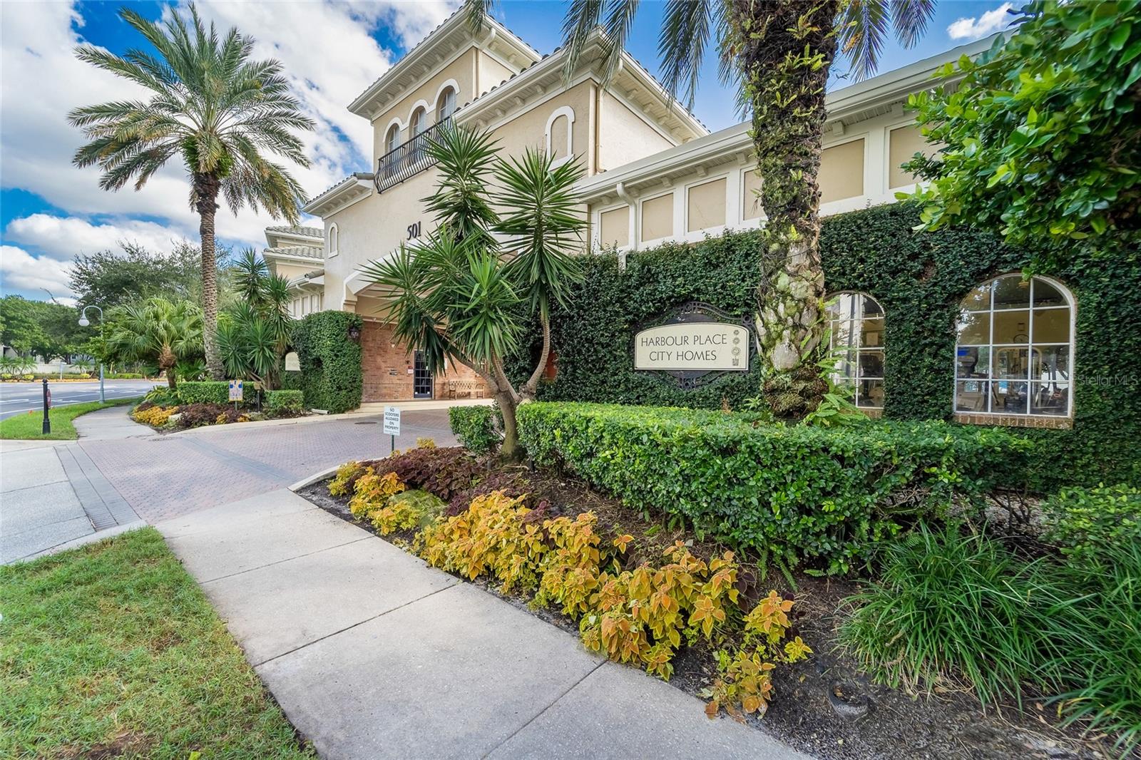 Discover elevated Island living in Harbor Island’s gated Harbor Place City Homes. Priced for immediate equity — the neighboring unit recently closed at $600,000 — and ready to sell ASAP, welcome to 501 Knights Run Ave, Unit 5102, a sophisticated townhouse-style 3-bedroom, 3.5-bath residence with each bedroom a private en suite and walk-in closet. Bright, open living areas showcase upgraded finishes and new hurricane-impact windows in key locations (2025) for added security and peace of mind. The primary bath has been tastefully refreshed with a double vanity, frameless glass shower, and updated lighting and fixtures, while the secondary baths feature new flooring, fixtures, and paint. Modern mechanicals and appliances include a new A/C (2024), new dishwasher, new LG washer/dryer, and a new garage door opener with app control. Practical conveniences rare in an urban setting include a two-car oversized garage, an extra assigned space, a guest parking pass, a main-level powder room for guests, an in-home laundry room, and contemporary ceiling fans and lighting throughout. The gated community also offers a pool and fitness center for residents. Perfectly positioned for walkability to Benchmark International for Lightning games and concerts, the Water Street District, the Riverwalk, Sparkman Wharf, the Florida Aquarium, and Lifetime Fitness, with transit options including the TECO Line Streetcar to Historic Ybor City and Downtown Tampa or Tampa’s Water Taxi to Davis Islands and Armature Works. This Harbor Island townhouse blends urban convenience with waterfront charm—schedule your showing today.