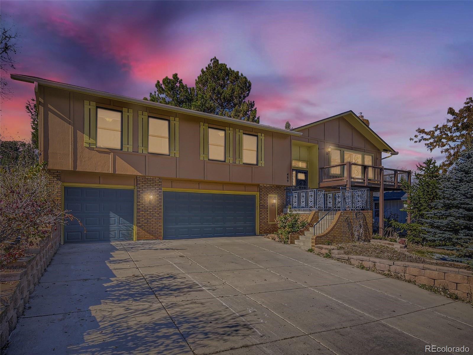 SAY YES TO CITY VIEWS!  BEAUTIFUL 4 Bedroom, 3 Bath Green Mountain Home in Quiet Neighborhood with 3 Car Oversized Garage on Generous Corner Lot!  Bright, Updated Kitchen (Stainless Appliances Included), Granite Countertops, with Pantry and Plenty of Cabinet Storage.  Kitchen Opens to Dining Room and Backyard/ Deck for Indoor/ Outdoor Living. True, Large Primary Bedroom Includes a Private Patio and 3/4 Bathroom.  Enjoy a Gas Fireplace and Yet Another Deck With CITY VIEWS Off the Living Room.  Cozy Garden Level Boasts 4th Bedroom, 3rd Bathroom and Additional Flex Space Perfect for Family Room, Office or TV/ Game Room (Use Your Imagination) with a 2nd Gas Fireplace, As Well As Laundry Area with Washer/ Dryer Hookups.  Outside Relax Nestled in a Large, Fully Fenced, Private Backyard with Mature Landscaping! Sprinkler System Surrounds the Home.  Less than 1 BLOCK TO OPEN SPACE!  Minutes to 6th Ave, Interstate-70 and C-470 for Easy Access to the Mountains and Metropolitan Denver.