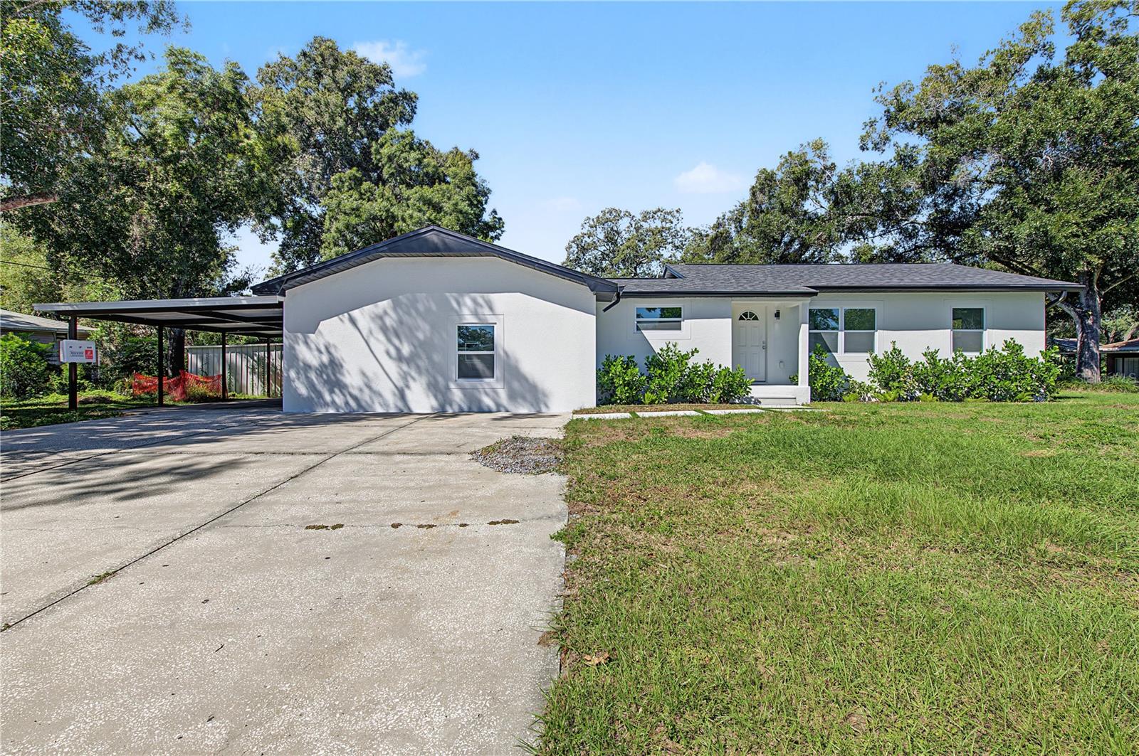 Opportunity to live in a quiet neighborhood with a unique oversized corner lot, rare to find in Tampa! Welcome to this stunning, newly remodeled 3 bed l 2 bath residency conveniently locate on a prime location.. From the moment you step inside, you will notice the extensive updates that have been made. This home has been tastefully upgraded with interior and exterior paint, kitchen cabinets and Quartz countertops, porcelain tile flooring throughout, completely remodeled bathrooms, light fixtures and much MORE. This home has the meat and bones needed for a new buyer. This home brings out the best of each room as they are situated in each of their own quarters. Not far off the highways, beaches, local to shopping centers and restaurants, you have the ideal location. Schedule your private showing TODAY!