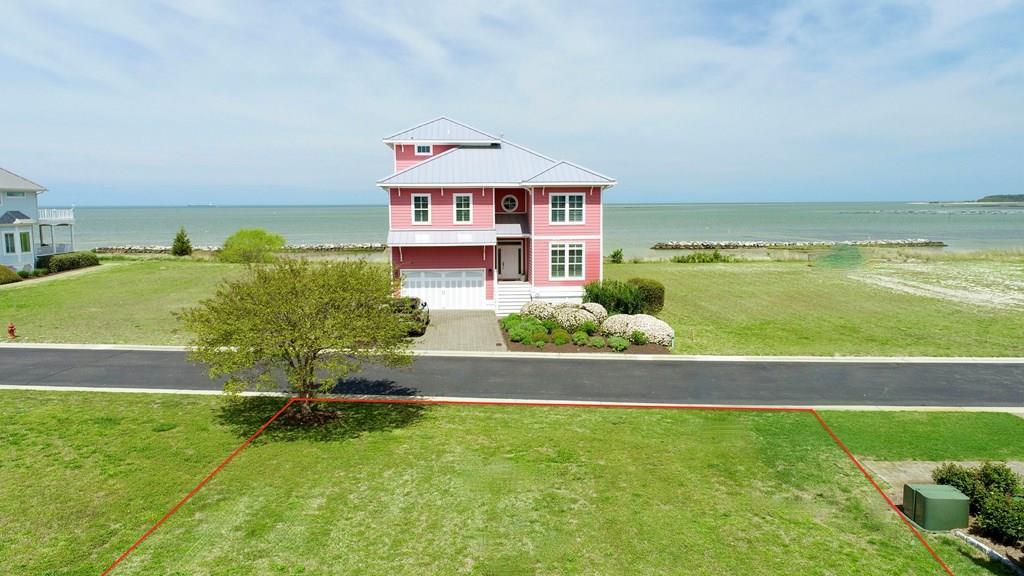 Ready to own your slice of paradise? Lot 58 in The Colony neighborhood at Bay Creek offers a fantastic opportunity to purchase a beautiful homesite with no pressure to build immediately. Whether you're envisioning a beach retreat, a weekend getaway, or a permanent residence, this lot provides the flexibility to explore your building options. Located near charming downtown Cape Charles, you'll be close to local restaurants, boutique shops, marinas, and everything that makes this lifestyle so unique. Hop in your golf cart and cruise to the private beach, explore miles of nature trails, enjoy a game of pickleball or fitness classes at the Life Center all just around the corner in Bay Creek! Come and tour this property today.