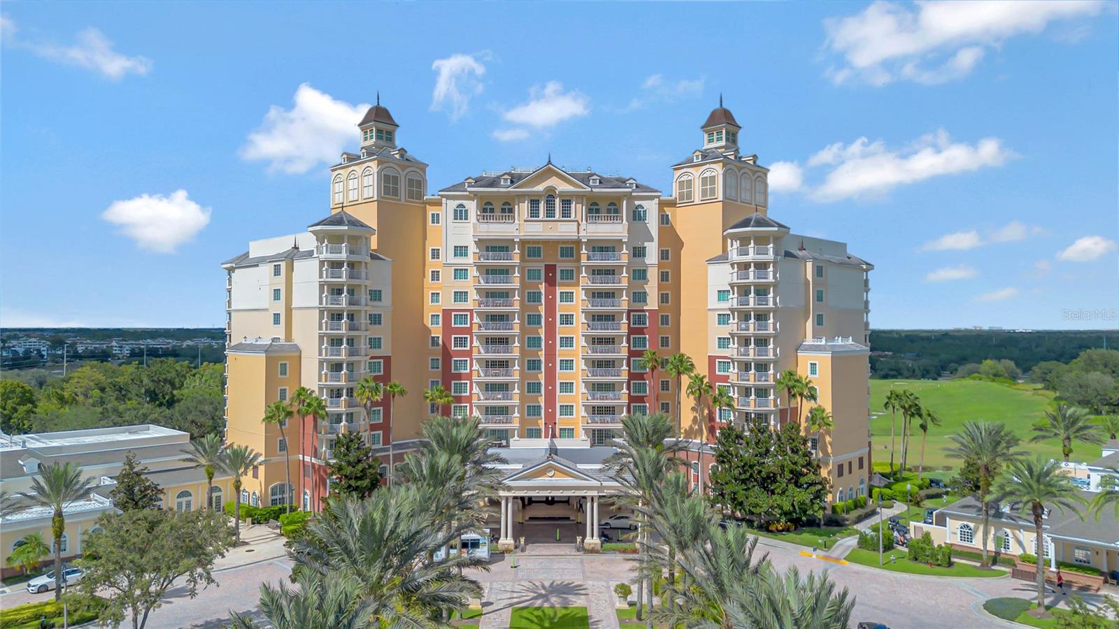 Experience luxurious living in this spacious 2 bedroom/ 2 bathroom, Condo nestled within the beautiful, gated Reunion Resort. Reunion offers 2,300 acres with three Private Championship Golf Courses from Jack Nicklaus, Arnold Palmer and Tom Watson. Indulge in unparalleled amenities that include pickle ball, tennis courts, mini golf, bike trails, dog parks, playgrounds, seven restaurants and bars, eight pools (including a 6-acre waterpark), and more, ensuring endless entertainment options. Enjoy mouthwatering steaks to the finest sushi all within the comfort of your building restaurants. Live entertainment awaits at the rooftop pool and bar with excellent food, views and memories to be had. Revel in the privacy afforded by the expansive grounds, all while enjoying your oasis. Active resort membership available.  Soak in the breathtaking panoramic views from your balcony, including nightly Disney fireworks displays.  With recent upgrades and turnkey convenience, now is the time to seize the opportunity to own where others dream.