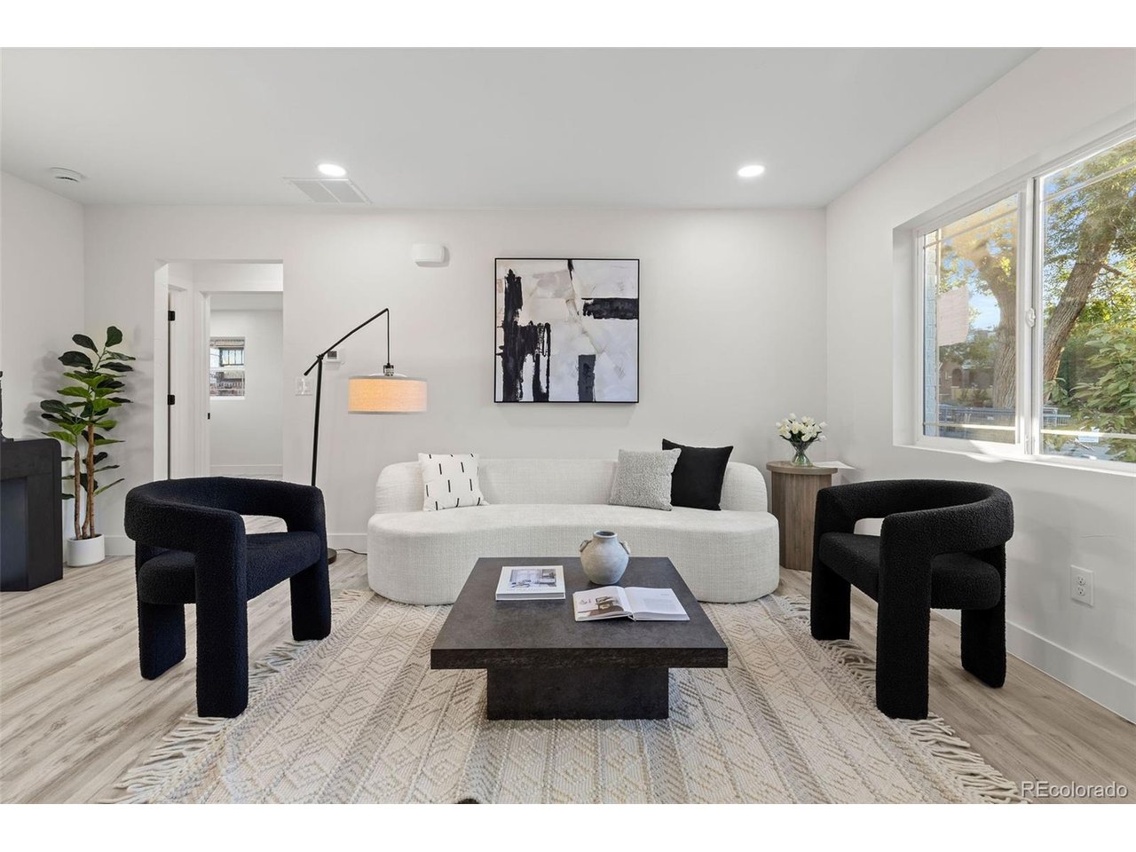 Modern design meets one of Denver's most sought-after neighborhoods in this beautifully reimagined North Park Hill residence. Thoughtfully renovated with a focus on style, quality, and functionality, the home offers a welcoming interior complemented by exceptional indoor-outdoor living.The main level is filled with natural light and features a refined, contemporary aesthetic throughout. At the heart of the home, the redesigned kitchen showcases sleek cabinetry, elevated finishes, generous workspace, and a full suite of new stainless steel appliances, creating a polished setting for both everyday living and entertaining.The finished lower level extends the home's versatility with additional living space ideal for guests, a home office, fitness area, media room, or other lifestyle needs. Thoughtful finishes and a cohesive design carry throughout, giving the home a truly turnkey feel.Outside, the fenced backyard offers a private extension of the living space, while an electric-operated rear gate provides convenient access to the oversized detached garage and additional paved area. Set in coveted North Park Hill, this residence pairs a complete modern transformation with the character and established surroundings of one of Denver's most desirable neighborhoods-a rare combination of design, location, and everyday functionality.