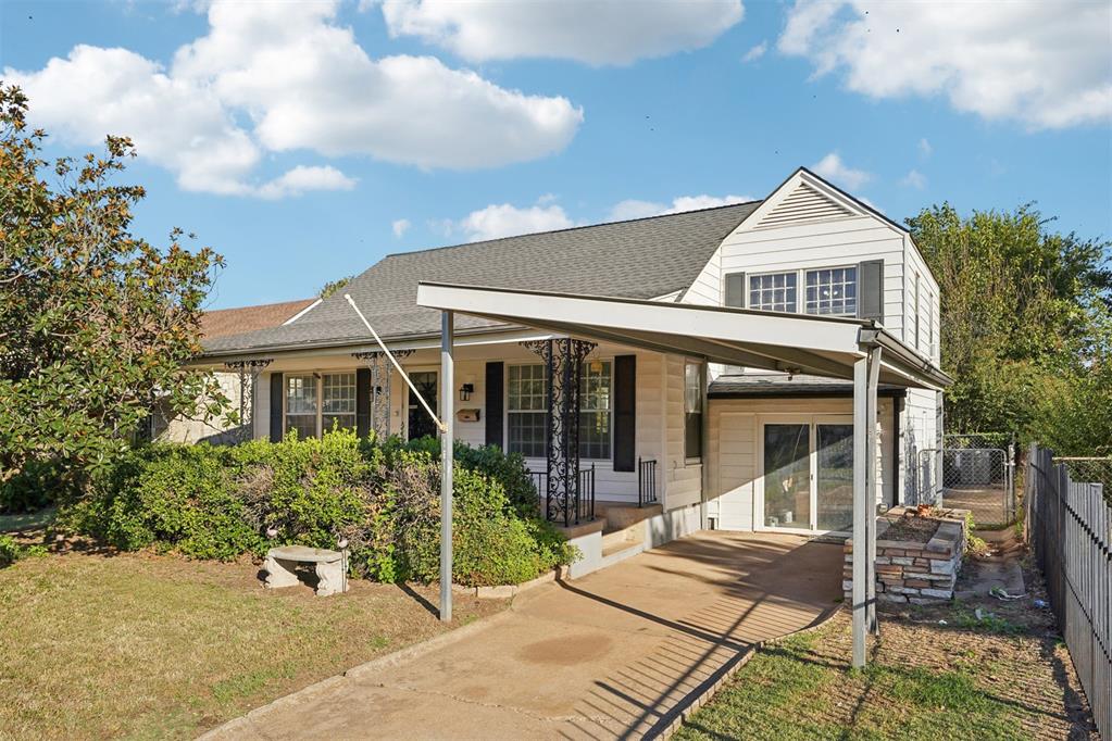Beautifully refreshed beauty! Perfectly situated on a desirable divided street and sitting on nearly a quarter-acre lot, this home combines classic character with modern updates and a location that’s hard to beat just 7 minutes to Classen Curve, Whole Foods, Uptown 23rd, and some of OKC’s best dining and shopping. Step up to the breathtaking front porch, perfect for morning coffee or evening sunsets, then enter into a light-filled living and dining area featuring freshly refinished original hardwood floors, new interior paint, and charming architectural details throughout. The kitchen shines with stainless steel appliances and plenty of cabinet and counter space ideal for both everyday meals and entertaining. Both bedrooms are spacious and inviting with original hardwood floors, ceiling fans, and lots of natural light. Enjoy one of the largest backyards in the neighborhood, complete with a deck for entertaining, separately fenced dog run, and tool shed for storage. A carport provides covered parking and flexibility for the new owner. With its central OKC location, charm, and functionality, it’s the perfect balance of historic character and modern convenience.