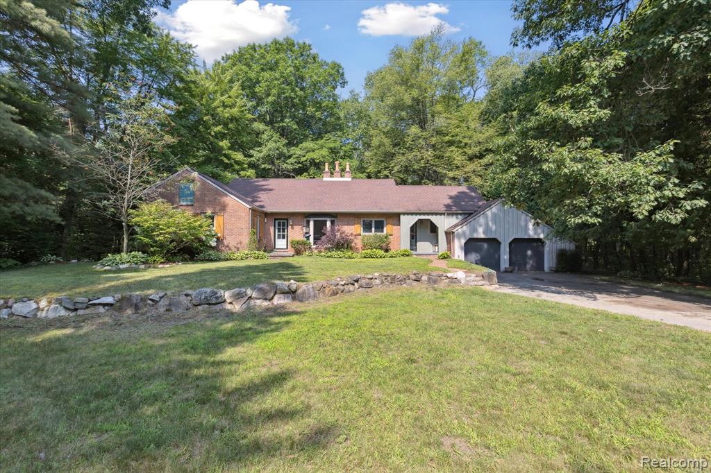 Secluded, peaceful living at its best. Bring the horses, hunters, car enthusiasts, or just want to get away from the busy cities.  Completely remodeled home sitting on a private road in the woods. New appliances (2022), new Geothermal (2022), new kitchen (2021), large master bedroom and en suite bath updated (2025).  100x36 eight stall box beam barn with room for more, 30x36 shop on the other side with a mechanics hoist and lots of storage room upstairs. Home sits on 11.5 acres and an additional 7.5-acre parcel is included in the sale for a total of 19 acres! This home cannot be viewed from the road. Please respect the privacy of others on the private road and only enter with a licensed real estate agent. Please remove your shoes when viewing the home.