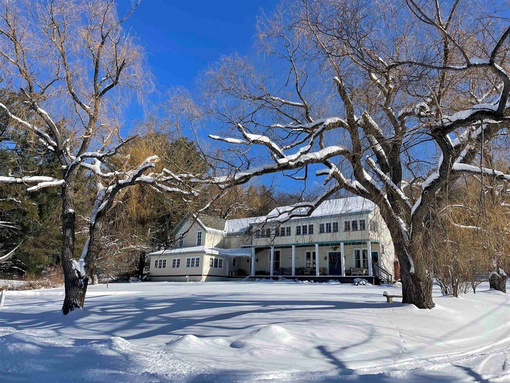 Step back in time with this extraordinary turn-of-the-century gem, originally the first courthouse of Otsego County. This historic property, rich in heritage and charm, is now available for the first time in years-a rare opportunity to bring your vision to life. Once serving as Otsego Countys original seat and courthouse, this remarkable building later became Reid's Inn, then the Poplar Inn, and most recently, the Otsego Lake Inn. Today, it stands as a private home, beloved for hosting reunions, receptions, and intimate gatherings. Boasting seven bedrooms several of which have access to the second floor enclosed sleeping porch, and four well-appointed bathrooms. This expansive home also features a grand game room known as the Saloon, a formal dining room that comfortably seats 16, and a stately reception parlor. The kitchen, complete with a pantry, is designed for hosting in style, while the multiple porches and verandas invite you to relax and soak in the surroundings. The outdoor space is equally enchanting, with a full-sized hot tub perfect for stargazing and viewing the northern lights, as well as an outdoor shower area. Located just three blocks from the picturesque Otsego State Park, this property is ideally situated near the Iron-Belle biking trail and the main Otsego snowmobile trail, making it a haven for outdoor enthusiasts. In the warmer months, explore the Golf Mecca with over thirty courses nearby, and in winter, enjoy the areas premier skiing-both downhill and cross-country-where Mother Nature provides the best snow in the lower peninsula. This remarkable home, sitting on just under half an acre, includes an additional 1.23-acre wooded parcel, offering even more potential for expansion or privacy. Zoned R-2, the property provides a myriad of possibilities for future use. Some furniture and antiques may be included in the sale, allowing you to preserve the historic charm and character that defines this unbelievable offering.
