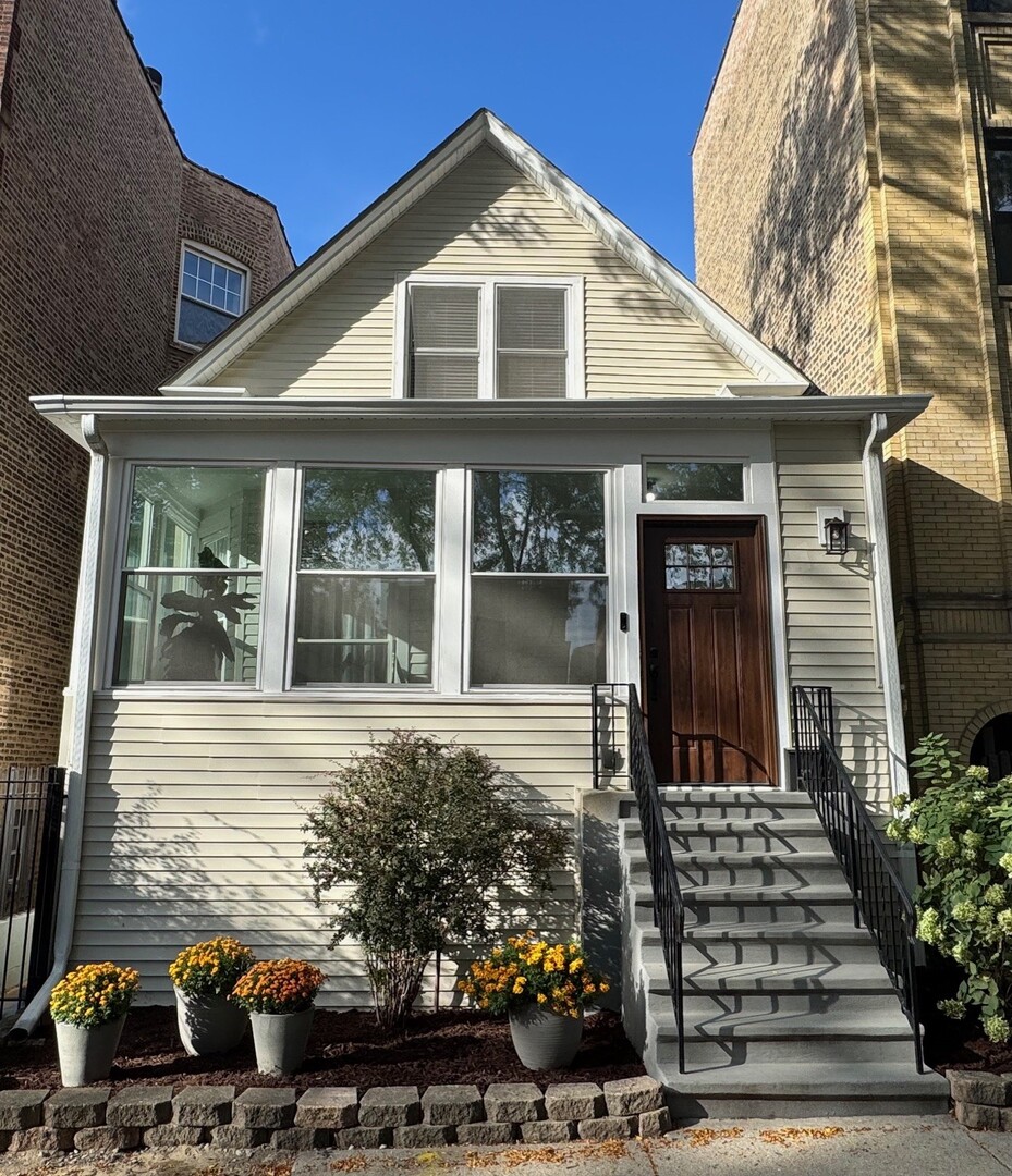 Gut rehabbed (2020+) and spacious 4 bedroom / 3 full bath home in Andersonville!  Open and airy living room with original leaded glass in bay window.  Separate dining room.  High ceilings, custom trim and crown moldings.  Enclosed and heated front porch with new windows (2024).  Open kitchen with designer 42" cabinets, SS appliances, designer backsplash and island.  Adjacent family room leads out to large deck.  Full bath and 1st floor bedroom.  Second floor features large primary bedroom with walk in closets and spa like bath with dual sink vanity, soaking tub and separate shower.  Large sitting room with cathedral ceilings and many skylights. Lower level features rec room with wet bar, full bath, storage and bedroom/workout room.  Designer laundry room with side- by- side W/D, cabinets and folding counter. Dual zoned HVAC.  Updated wiring and fully replaced electrical box.  Updated plumbing throughout.  New city water and gas line from street to the house (2025).  Roof replaced ans skylights added (2017).  Windows replaced (2015).  All new siding (2025).  Fenced yard with flower gardens and 2 car garage.  Prime Andersonville location close to restaurants, shops, Gethsemane, Metra, L, the lake, beaches and bike path.