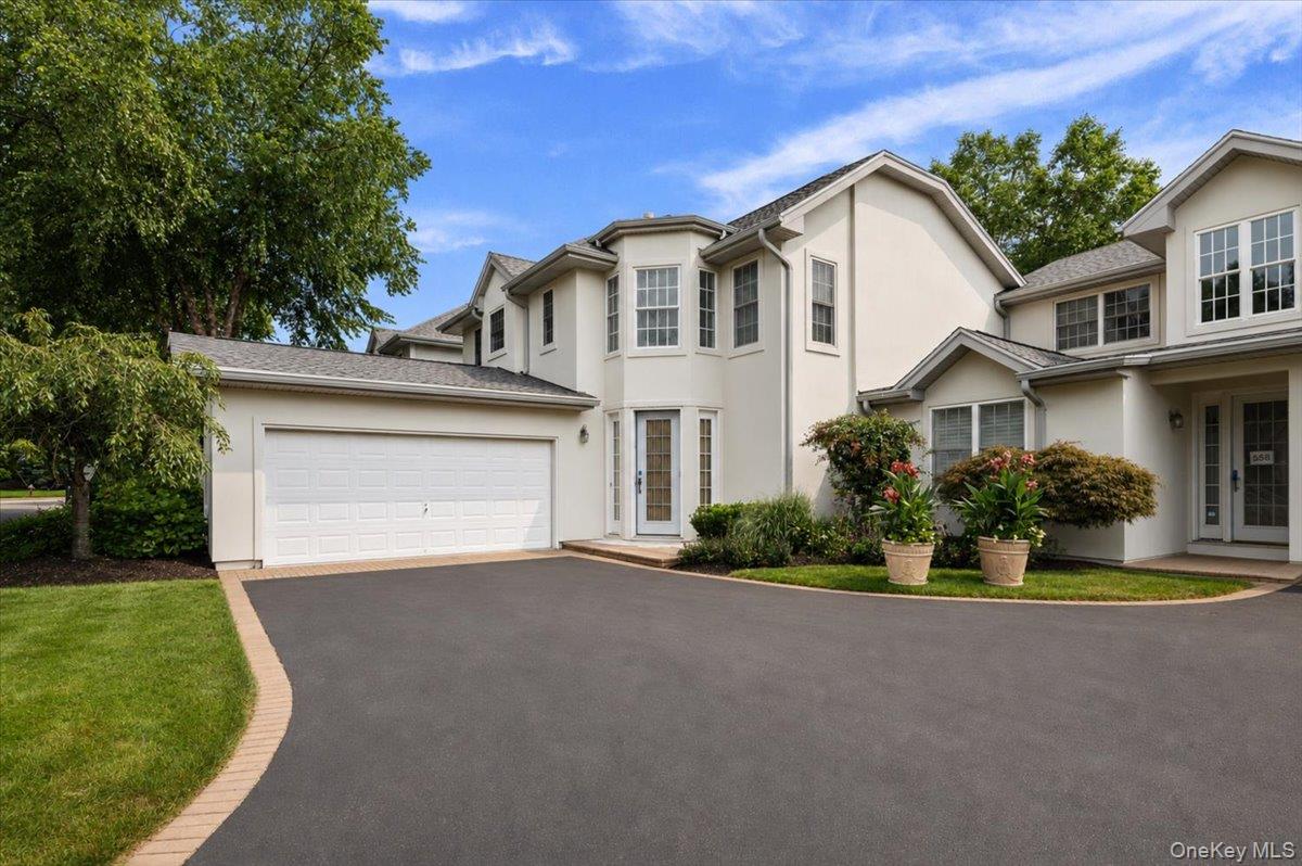 Welcome to 559 Bardini Drive, a beautifully designed Mirasol model condo in the Melville Greens. This spacious 3 bedroom, 3 bathroom home features an open floor plan, a main floor primary suite, and an oversize living room with soaring vaulted ceilings. With a 2 car garage and ample parking, this unit is perfect for entertaining. Nestled in a quiet location within the community, this home offers comfortable living with a peaceful setting. This gated 55+ community features a full country club with golf course, tennis, pool, and full clubhouse with too many features to mention.