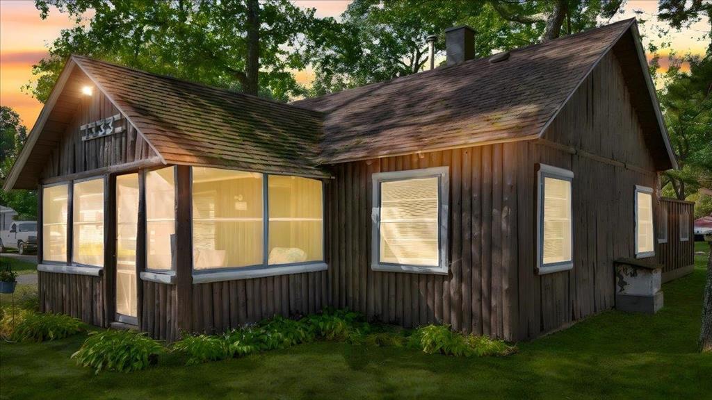 Cedar log cabin, full of rustic charm and character, this home sits on a corner lot less than 1/4 mile from the Sand Lake boat launch and within walking distance to hundreds of miles of ATV and snowmobile trails! Close to all the amenities this lake community has to offer - restaurants, fishing, boating, swimming, tennis, pickle ball, playground, community center - A true recreational paradise! Inside, youll enjoy an open floor plan thats perfect for gatherings, along with a cozy screened-in porch where you can relax and take in the peaceful surroundings. Outside, the property is well-equipped with a new (2019) 24x28 garage featuring cement floors and electric, plus an extra 20x18 storage shed, also with cement floors and electric-plenty of room for all your toys and tools! This property offers the perfect blend of rustic charm and modern convenience.