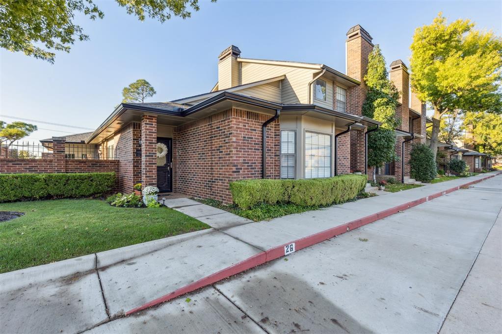 WATERFORD FLAT, rarely available. Gated community with security guard and two swimming pools. This 2 bed 2.5 bath unit is all on one level and has been updated. Beautiful electric fireplace with plenty of built in shelves and cabinets. Updated kitchen with cabinets to the ceiling, breakfast bar and open to the dining room. Primary suite opens on to private patio. There is private shower bath combo and a walk in closet with built in dresser. Guest bedroom has an on suite bath. Windows with plantation shutters extend from the entry, across the living room and the dining room. There is a two car attached garage, laundry room, large patio with privacy wall. This unit is across the street from one of the pools. The HOA replaced the roof, the gutters and painted the building this summer.