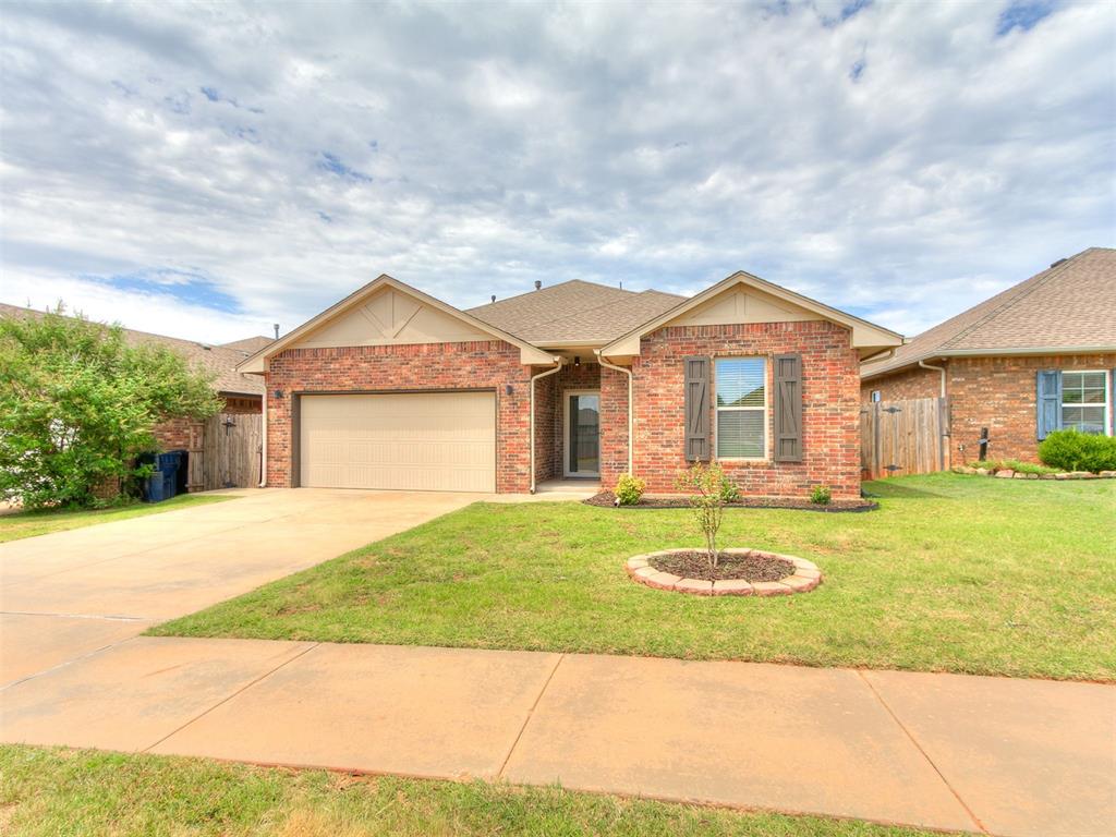 Looking for a home within walking distance to restaurants and close to Portland?  This like new Brass Brick home is the one!  With a large backyard and covered back porch you'll have it all.  Brand new carpet in the beautiful family room, new AC system in 2024, fireplace, large master suite, ceramic tile throughout, granite countertops, storm shelter in garage and so much more.  Don't miss the community playground and basketball court! Schedule your showing today!