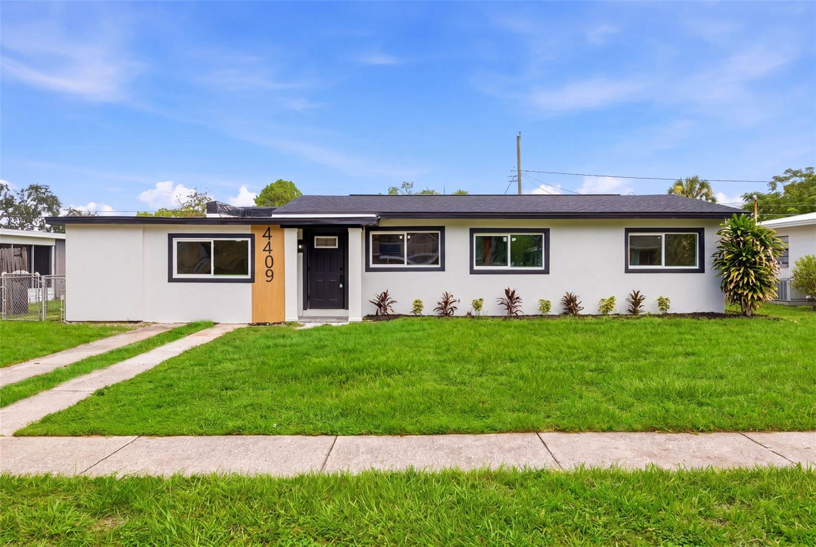 Welcome to this beautifully renovated 4-bedroom, 2-bath South Tampa home, where modern style meets peace of mind.The home did not flood during the recent storms, offering added confidence in this desirable South Tampa location.  Thoughtfully redesigned with an open-concept floor plan, this move-in-ready home has been updated from top to bottom with quality craftsmanship and fully permitted improvements.The stunning new kitchen features quartz countertops, brand-new cabinetry, and new stainless steel appliances, seamlessly flowing into the spacious living and dining areas—perfect for everyday living and entertaining. Both bathrooms have been completely remodeled with contemporary finishes.Enjoy the confidence of extensive major upgrades, including new hurricane-rated windows, a new roof and flat roof, new screened-in lanai, newer A/C, new air ducts, new insulation, new water heater, new electrical panel with complete whole-house rewire, new plumbing, and fresh modern stucco.Conveniently situated just minutes from the waterfront, Downtown Tampa, St. Petersburg, shopping, dining, entertainment, and major roadways, this home combines exceptional updates with an unbeatable location. Simply move in and enjoy worry-free living!