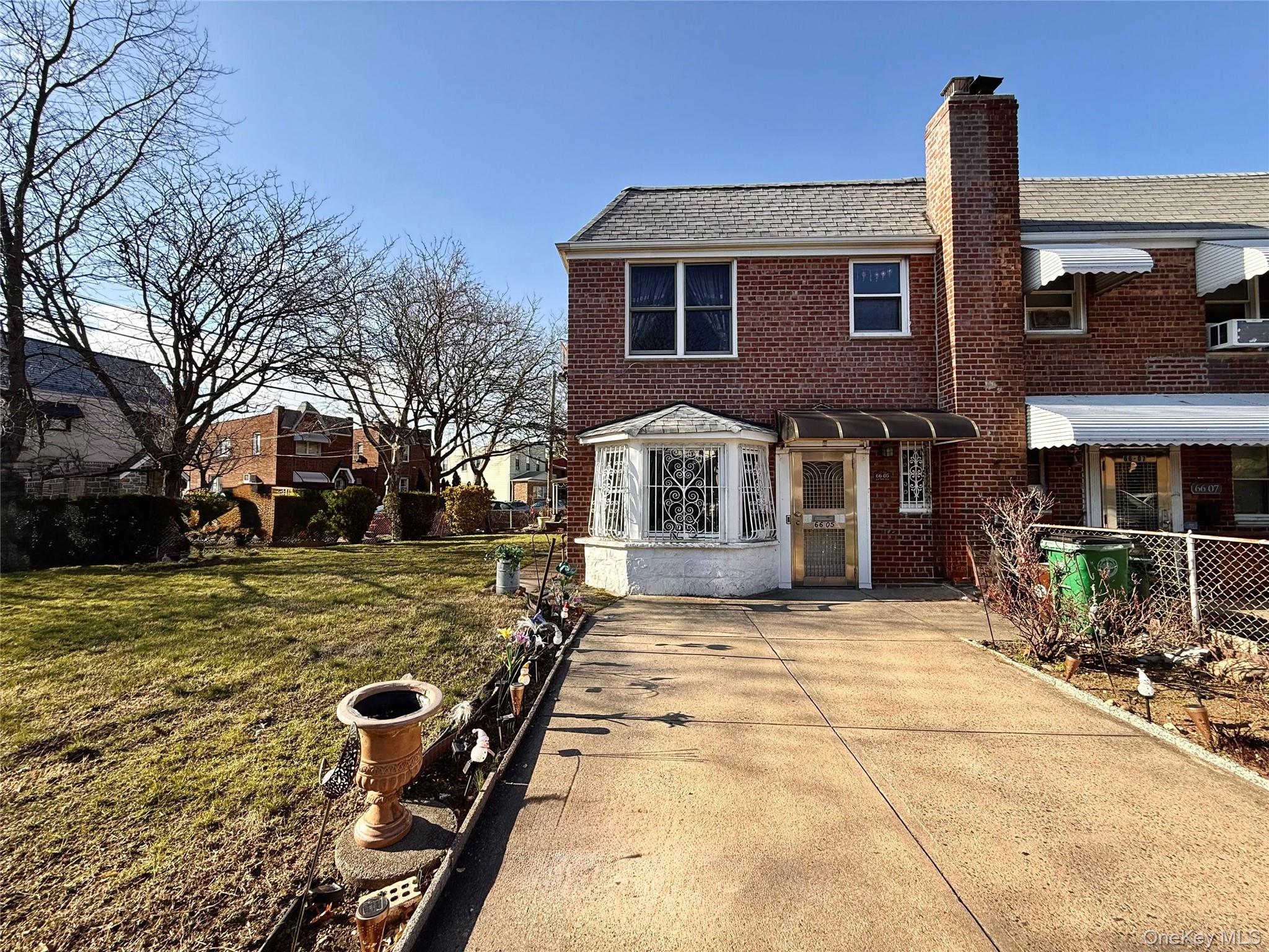 THIS SINGLE SEMIDETACHED BRICK HOME IS SITUATED ON A GENEROUS 38X129 CORNER LOT IN WOODSIDE, WITH A BUILDING SIZE OF 20X40. FEATURING A DETACHED TWO CAR GARAGE, THIS PROPERTY INCLUDES A LARGE FRONT YARD, EXPANSIVE SIDE YARD, AND A CEMENTED PATIO, CREATING EXCEPTIONAL OUTDOOR SPACE. THE PROPERTY ENJOYS A CORNER POSITION WITH THE MAIN ENTRANCE ON GARFIELD AVENUE AND A SIDE ENTRANCE ON 66TH STREET. FROM THE GARAGE, ACCESS FLOWS DIRECTLY INTO THE PATIO AND INTO THE HOME THROUGH THE REAR ENTRY. A SPACIOUS DRIVEWAY ENHANCES THE FRONT YARD.UPON ENTRY, A FOYER WITH A LARGE COAT CLOSET SETS A WELCOMING TONE. THE LIVING ROOM, DINING AREA, AND KITCHEN FEATURE BEAUTIFUL ITALIAN MARBLE TILE IN A LARGE 24X36 FORMAT, CREATING A CLEAN AND ELEGANT CONTINUOUS DESIGN. THE LIVING ROOM INCLUDES A DOUBLE PANEL WINDOW FACING THE REAR OF THE HOME AND DIRECT ACCESS TO THE PATIO. THE DINING AREA SITS ADJACENT TO THE LIVING ROOM AND OPEN TO THE KITCHEN, WITH ITS OWN WINDOW, A WALL AC UNIT, AND A DOOR LEADING OUT TO THE PATIO.THE RENOVATED KITCHEN FEATURES LIGHT COLORED WOODEN CABINETRY EXTENDING FROM FLOOR TO CEILING, STAINLESS STEEL APPLIANCES, BLACK GRANITE COUNTERTOPS, AND MARBLE TILE FINISHES.THE FIRST FLOOR ALSO INCLUDES A BEDROOM WITH A BAY WINDOW AND A FULLY UPDATED BATHROOM SHOWCASING EUROPEAN INSPIRED DETAILS, INCLUDING DELICATE TILE FLOORING, INTRICATE WALL TILE PATTERNS, A WINDOW, AND GLASS SHOWER DOORS ON THE BATHTUB. THE BOILER ROOM, ELECTRICAL PANEL, GAS SYSTEM, AND LAUNDRY AREA ARE CONVENIENTLY LOCATED ON THIS LEVEL.CENTRALLY POSITIONED STAIRS LEAD TO THE SECOND FLOOR, WHERE THREE FULL BEDROOMS AND AN ADDITIONAL GUEST ROOM OR OFFICE ARE LOCATED. THE PRIMARY BEDROOM FACES THE FRONT OF THE HOME AND FEATURES A LARGE DOUBLE PANEL WINDOW ALONG WITH A SIDE WINDOW FOR ADDED LIGHT. THE SECOND BEDROOM IS SPACIOUS AND INCLUDES A PRIVATE BALCONY AND A SMALL STORAGE AREA. THE THIRD BEDROOM FACES THE REAR OF THE HOME, AN ADDITIONAL ROOM PROVIDES FLEXIBILITY AS A GUEST BEDROOM OR HOME OFFICE. THERE IS NO BASEMENT.THIS PROPERTY BENEFITS FROM ACCESS TO MULTIPLE TRANSPORTATION OPTIONS. THE 67th AVENUE STATION SERVING THE M AND R TRAINS IS APPROXIMATELY 0.6 MILES AWAY, WHILE THE WOODSIDE STATION IS ABOUT 1.1 MILES AWAY, PROVIDING ACCESS TO THE 7 TRAIN AND THE LIRR. SEVERAL BUS LINES, INCLUDING THE Q18 AND Q32, OPERATE WITHIN APPROXIMATELY 0.2 TO 0.4 MILES.