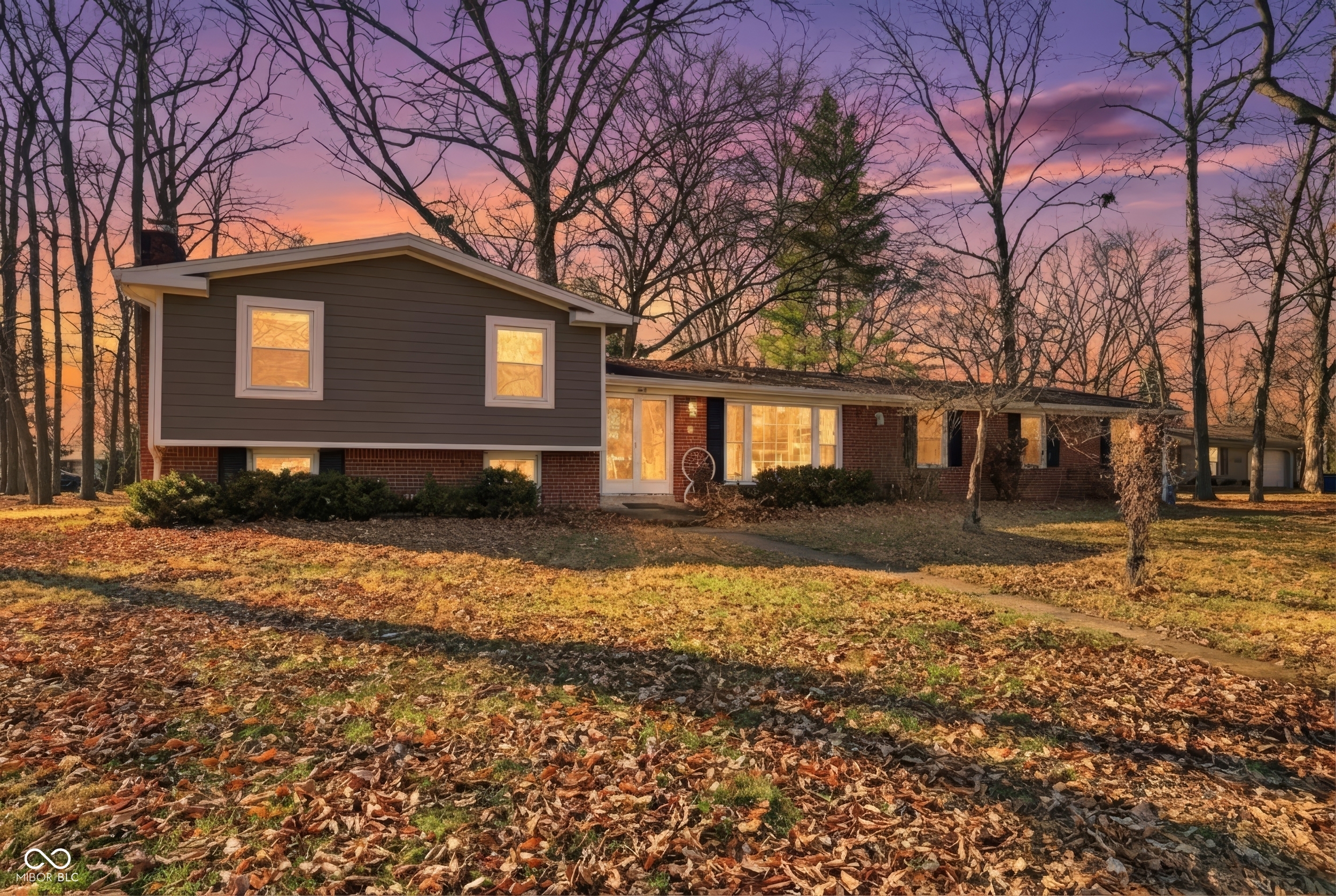 This single family home in Carmel, Indiana offers 2,064 square feet of living space on a 0.32-acre lot. Built in 1962, this tri-level property features 4 bedrooms and 2 bathrooms. The home includes a new roof, siding, and windows (all replaced within the last 5 years), giving the exterior a fresh, updated look. Inside, the layout provides a large family room on the lower level, an office that could serve as a fifth bedroom, and a spacious laundry room next to the attached 2-car garage with a workspace. The HVAC, electrical, and plumbing systems are reported to be in good working condition, and the home is equipped with central air and gas forced air heating. Additional highlights include an enclosed Florida room, a fenced yard, and a shed for extra storage. The property is located in a desirable area with access to Carmel schools. This home is ready for your personal updates and offers strong potential for investors seeking a solid property with great curb appeal and flexible living space.