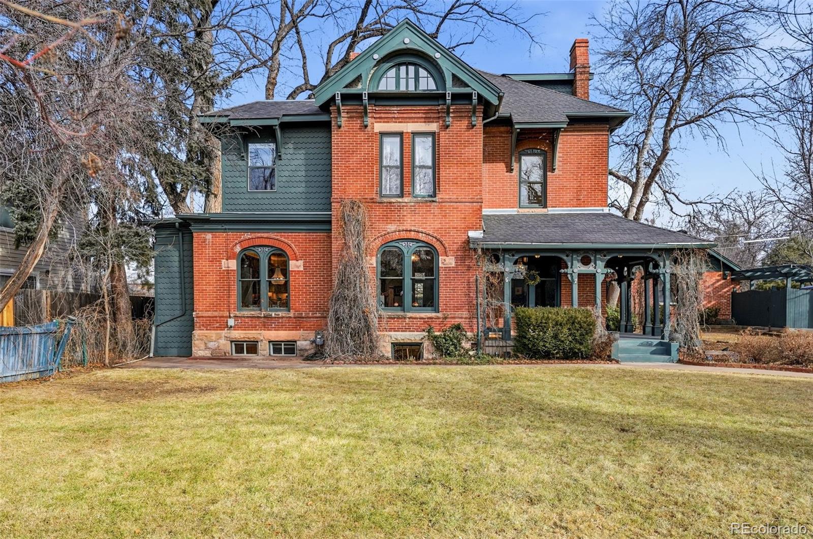 Iconic. Irreplaceable. A rare opportunity to own one of Montclair’s most iconic residences. Known as Ardmore Place, this stately Cochrane Victorian was originally built for Montclair’s first mayor and remains a landmark of architectural significance. Set on an extraordinary 13,500-square-foot, this three-story brick mansion offers timeless grandeur, modern luxury, and a setting that feels like your own private urban retreat. The home features 5 bedrooms and 5 bathrooms, and a spectacular third-floor primary suite complete with a private balcony, mountain views, skylights, office, walk-in closet, spa-like bath, and its own dedicated laundry. The primary bath showcases dual vanities, a soaking tub, an oversized rain shower and generous natural light. Inside, historic craftsmanship shines with original moldings, trim, banisters, ornate woodwork, intact curved staircase, 8-foot pocket doors, hardwood floors throughout the first and second levels, and architectural eye-catchers at every turn. Formal living and dining spaces, a grand entry foyer, parlor, fireplaces, and a powder room inspired by European design create an atmosphere of refined elegance. The impressive professional kitchen is designed for serious cooks and entertainers alike, featuring a Sub-Zero Pro refrigerator, Wolf gas range with griddle and double ovens, pot filler, farmhouse and prep sink, exposed brick, granite counters, under-cabinet microwave, large pantry, two wine/beverage refrigerators, skylights, and both counter seating and table dining. Outside, the grounds are nothing short of exceptional: mature oak and maple trees, koi pond water feature, outdoor lighting, wrap-around covered porch with revival trim, and expansive green space that truly feels like your own private park. An oversized 2-car garage (plus additional off-street parking) completes this extraordinary offering.