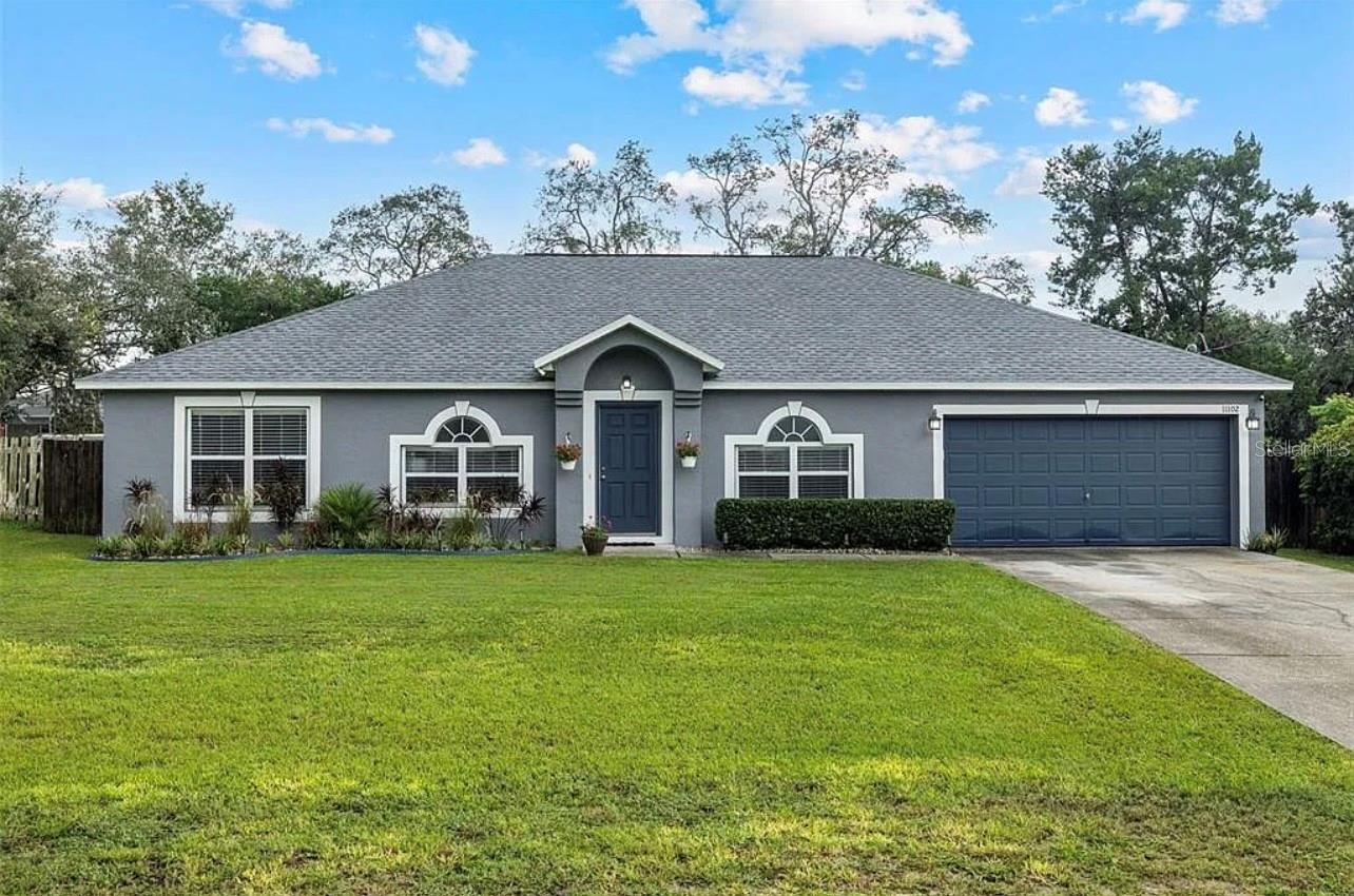 4-bedroom, 2-bathroom pool home featuring an open living and dining area.