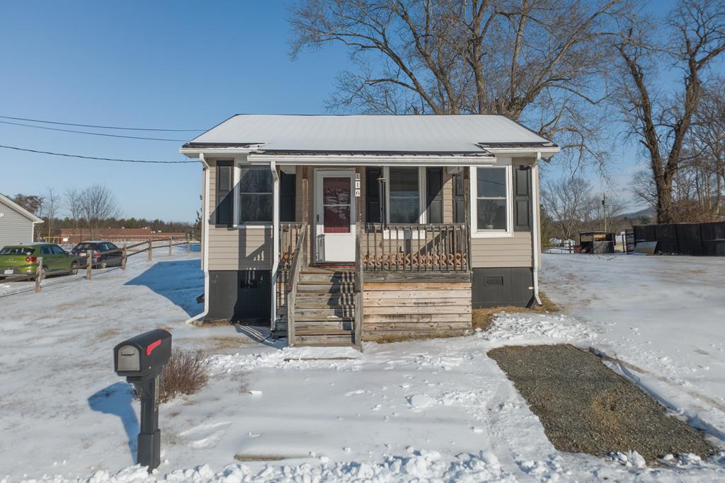 This adorable 1 bedroom, 1 bath home is tucked away in a quiet neighborhood and conveniently located near the New River, theNew River Trail, and endless outdoor recreation. Hiking, biking, kayaking, camping, hunting, horse trails, picnicking—and so much more—are all rightoutside your door. The seller has completed several upgrades over the past three years, including a new metal roof, added insulation underneath thehome, and a new washer and dryer. This property would make a fantastic weekend retreat, cozy starter home, or solid investment opportunity. Anadditional lot is included with its own county water hookup. Come see if this charming home is the perfect fit for you!